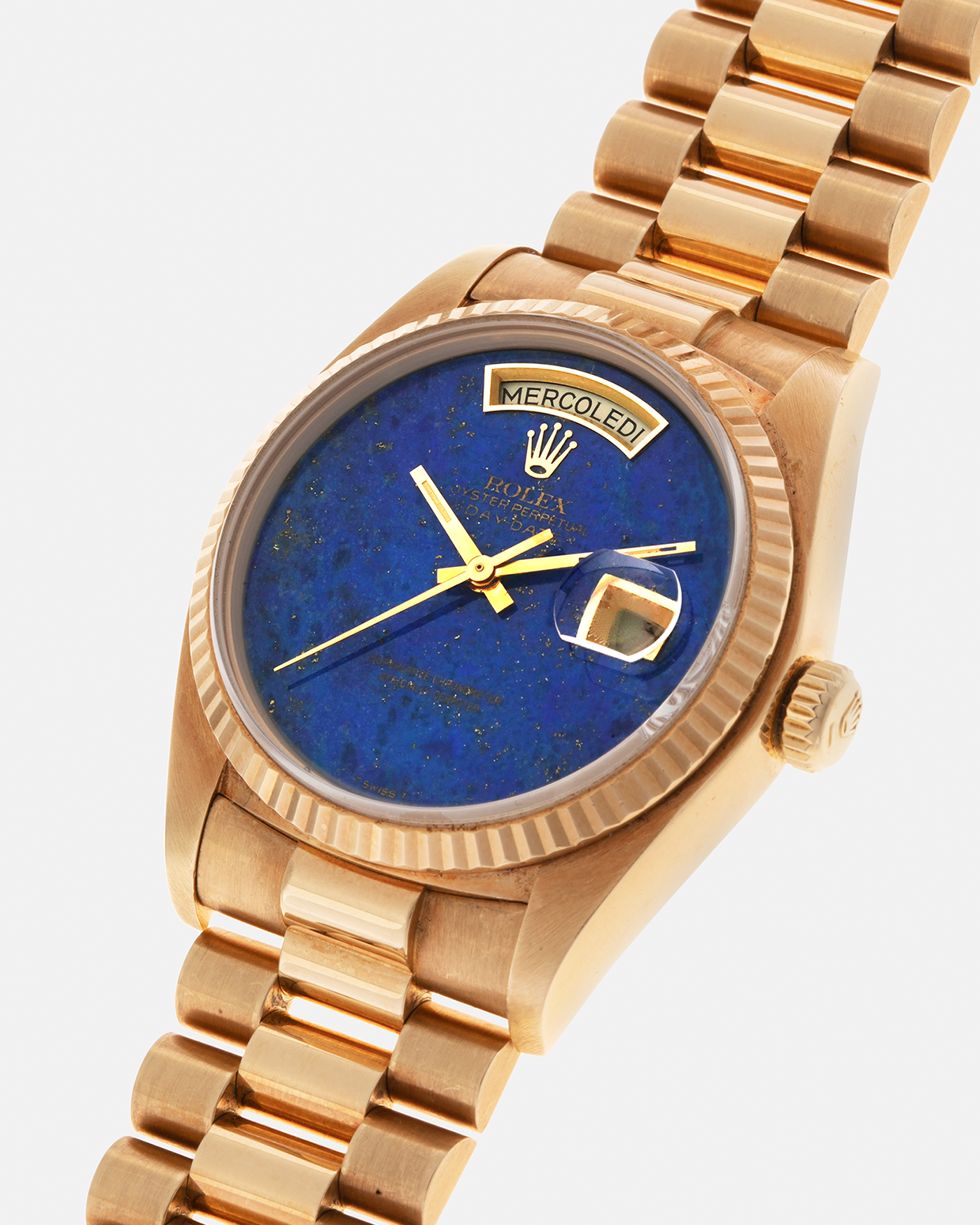 Brand: Rolex
Year: 1979
Model: Day-Date
Reference Number: 18038
Serial: 6217XXX
Material: 18-carat Yellow Gold
Movement: Rolex Cal. 3055, Self-Winding
Case Diameter: 36mm x 12mm (43mm Lug-to-Lug)
Lug Width: 20mm
Bracelet:  Rolex ‘8385’ 18-carat Yellow Gold Presidential Bracelet with ‘55’ Curved End Links and Signed Clasp