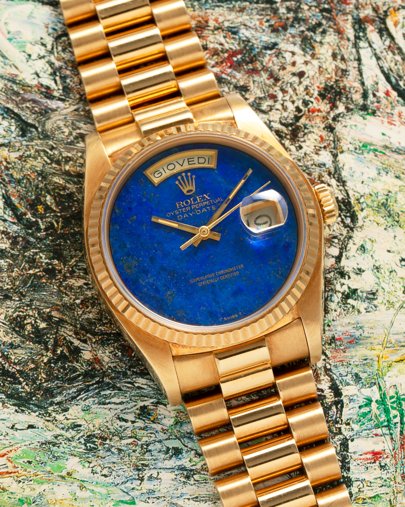 Brand: Rolex
Year: 1979
Model: Day-Date
Reference Number: 18038
Serial: 6217XXX
Material: 18-carat Yellow Gold
Movement: Rolex Cal. 3055, Self-Winding
Case Diameter: 36mm x 12mm (43mm Lug-to-Lug)
Lug Width: 20mm
Bracelet:  Rolex ‘8385’ 18-carat Yellow Gold Presidential Bracelet with ‘55’ Curved End Links and Signed Clasp