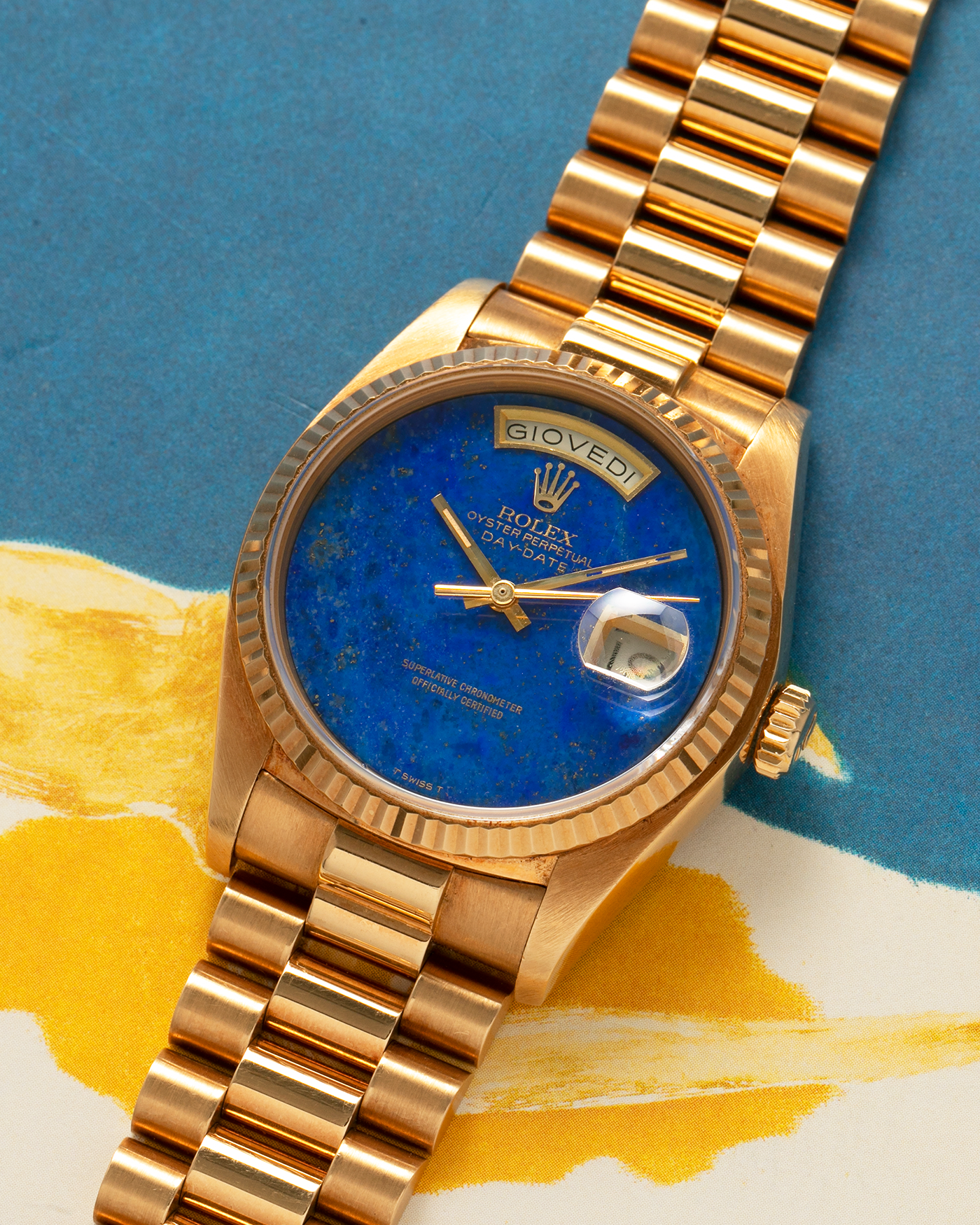 Brand: Rolex
Year: 1979
Model: Day-Date
Reference Number: 18038
Serial: 6217XXX
Material: 18-carat Yellow Gold
Movement: Rolex Cal. 3055, Self-Winding
Case Diameter: 36mm x 12mm (43mm Lug-to-Lug)
Lug Width: 20mm
Bracelet:  Rolex ‘8385’ 18-carat Yellow Gold Presidential Bracelet with ‘55’ Curved End Links and Signed Clasp