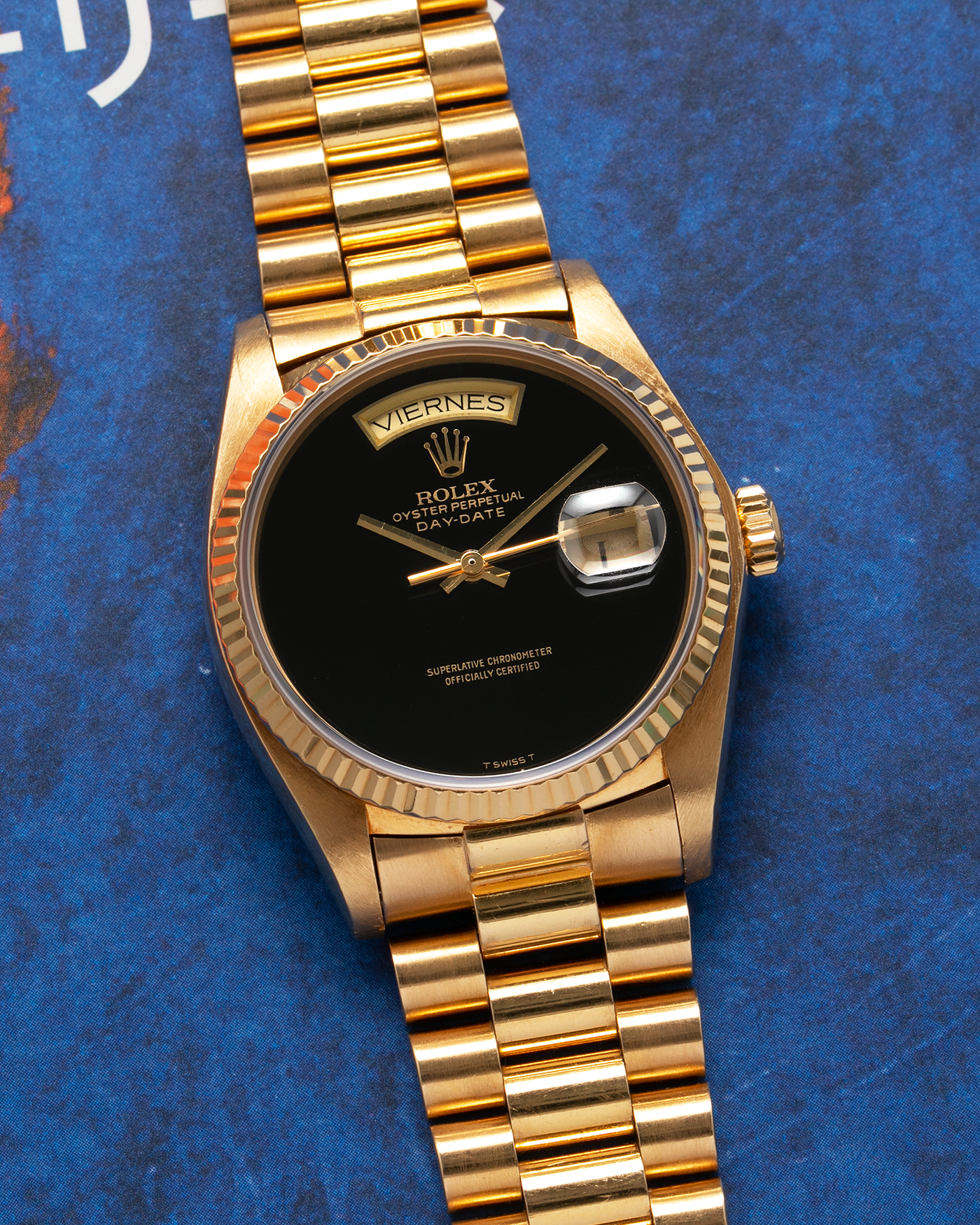 Brand: Rolex Year: 1979 Model: Day-Date, ‘Onyx’ Reference Number: 18038 Serial: 625XXXX Material: 18-carat Yellow Gold, Black Onyx Dial Movement: Rolex Cal. 3055, Self-Winding Case Diameter: 36mm Lug Width: 20mm Bracelet: Rolex ‘8385’ 18-carat Yellow Gold Presidential Bracelet with ‘55’ Curved End Links