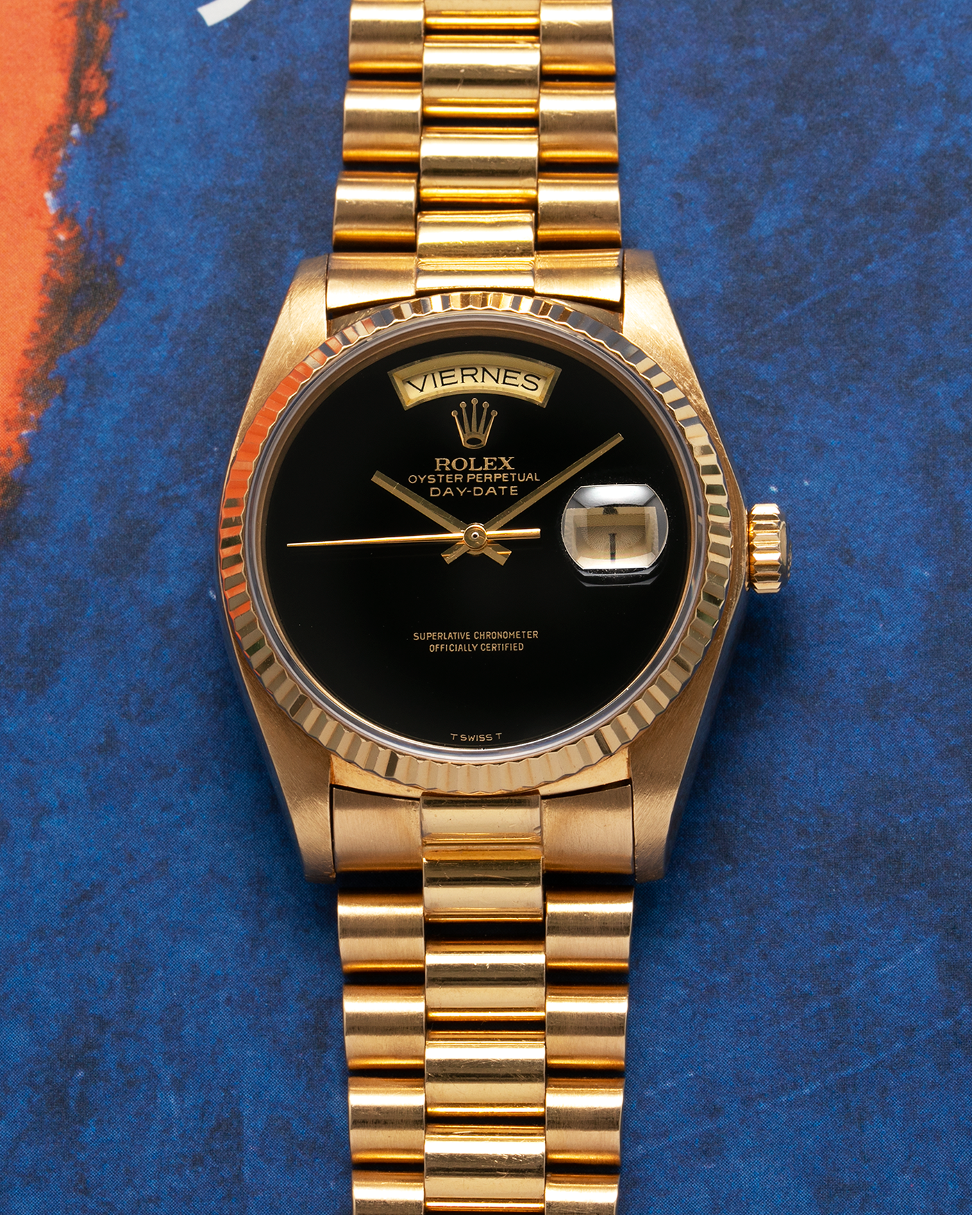 Brand: Rolex Year: 1979 Model: Day-Date, ‘Onyx’ Reference Number: 18038 Serial: 625XXXX Material: 18-carat Yellow Gold, Black Onyx Dial Movement: Rolex Cal. 3055, Self-Winding Case Diameter: 36mm Lug Width: 20mm Bracelet: Rolex ‘8385’ 18-carat Yellow Gold Presidential Bracelet with ‘55’ Curved End Links