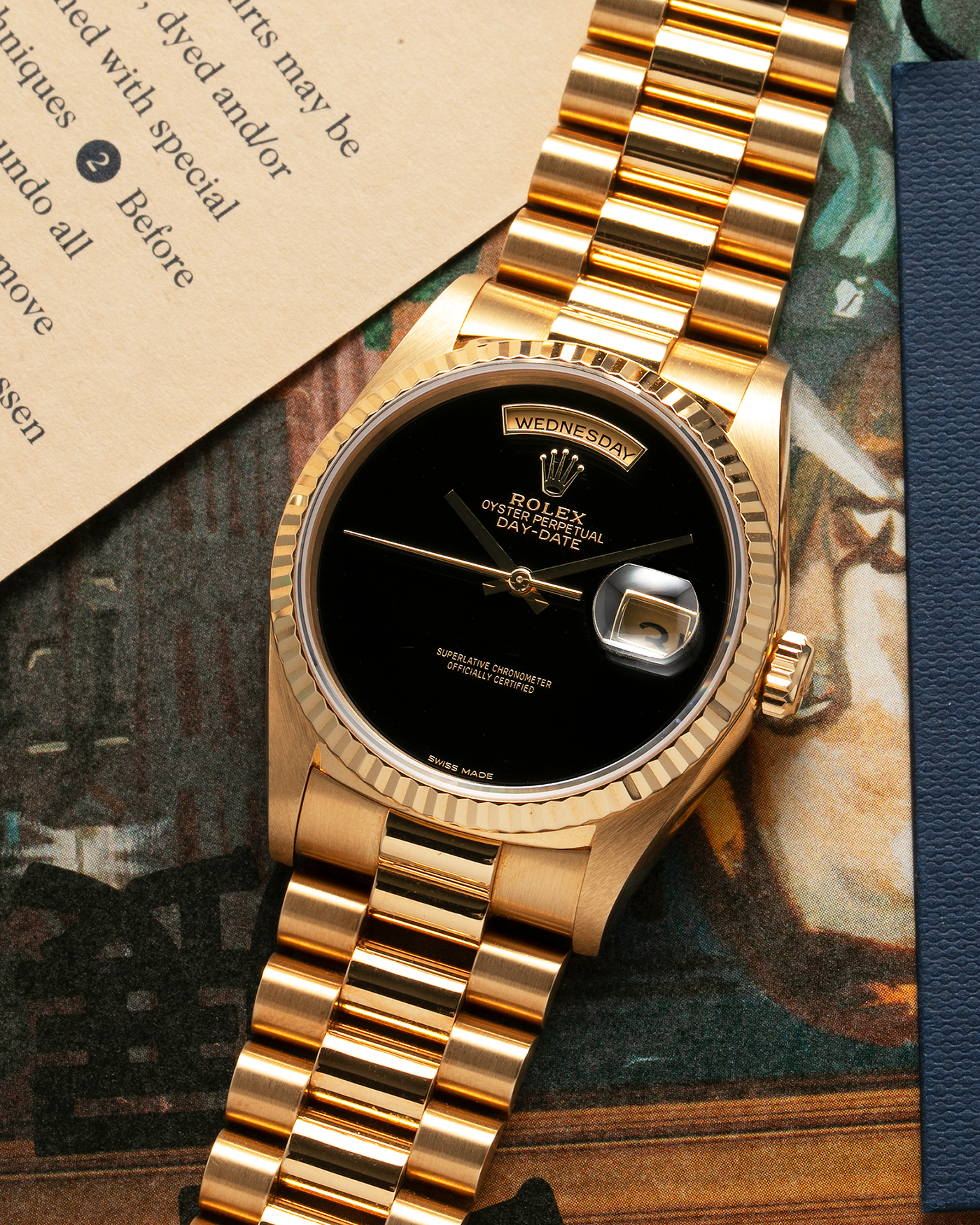 Brand: Rolex Year: 1996 Model: Day Date Reference Number: 18238 Serial Number: W409XXX Material: 18-carat Yellow Gold, Black Onyx Dial Movement: Rolex Cal. 3155, Self-Winding Case Diameter: 36mm Lug Width: 20mm Bracelet: Rolex 18-carat Yellow Gold 8385 Presidential Bracelet with 55B Curved End Links