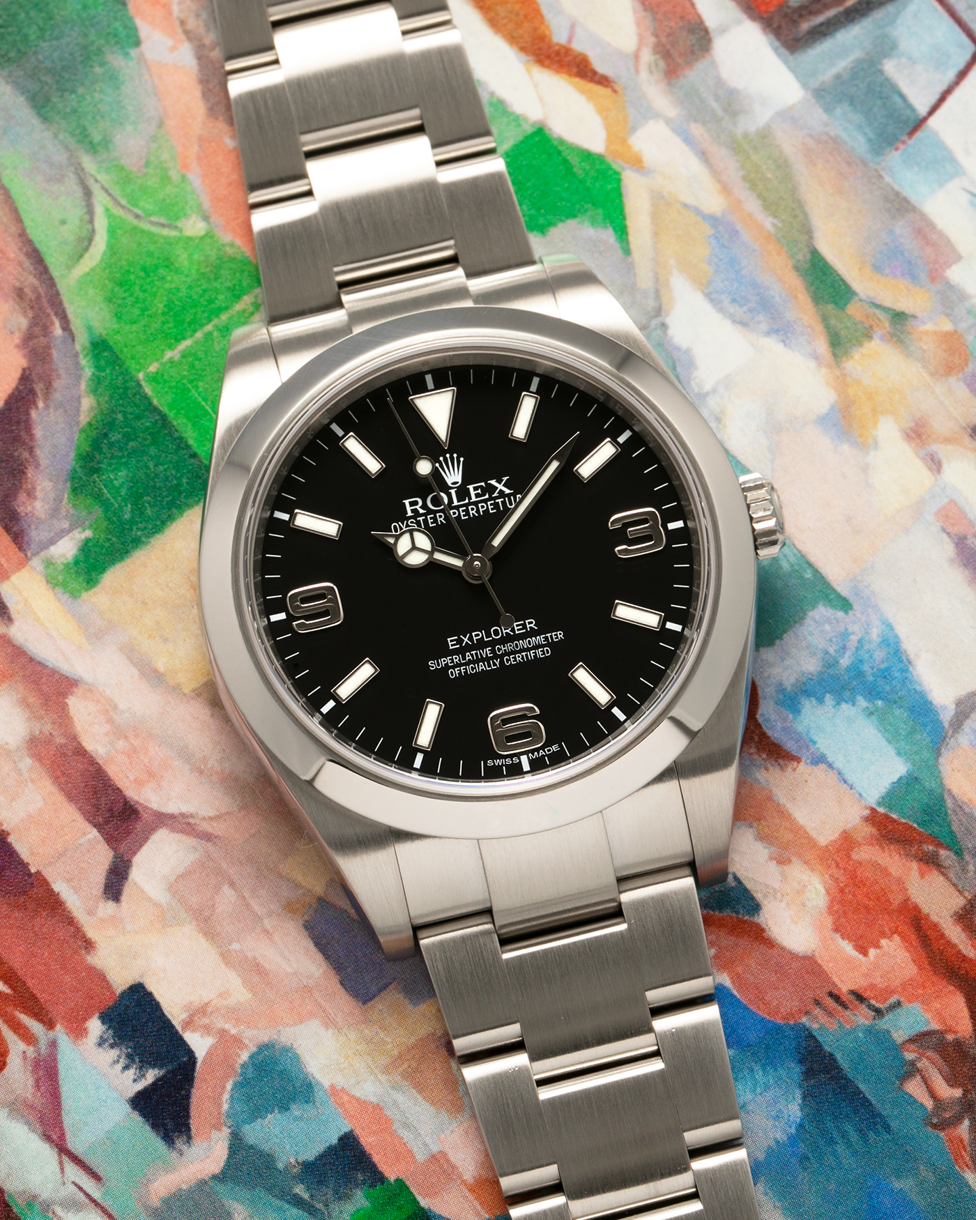 Brand: Rolex Year: 2015 Model: Oyster Perpetual Explorer I Reference Number: 214270 Case Material: Oystersteel (904L Stainless Steel) Movement: Rolex Cal. 3132, Self-Winding Case Diameter: 39mm Lug Width: 20mm Bracelet: Rolex Oyster Bracelet in Oystersteel with Signed Oysterlock Clasp