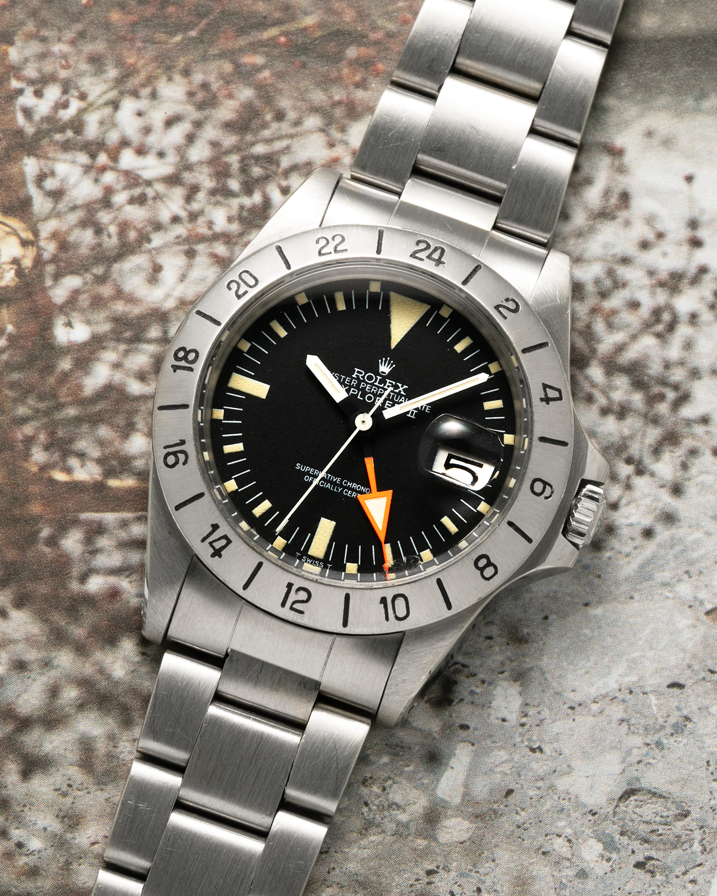 Brand: Rolex Year: 1972 Model: Explorer II ‘Straight Hand’ Reference Number: 1655 Serial Number: 318XXXX Material: Stainless Steel Movement: Rolex Cal. 1575, Self-Winding Case Diameter: 39mm Lug Width: 20mm Bracelet: Rolex VE Steelinox ‘78360’ Oyster Bracelet with ‘580’ Curved End Links, additional Rolex C&I Riveted Bracelet
