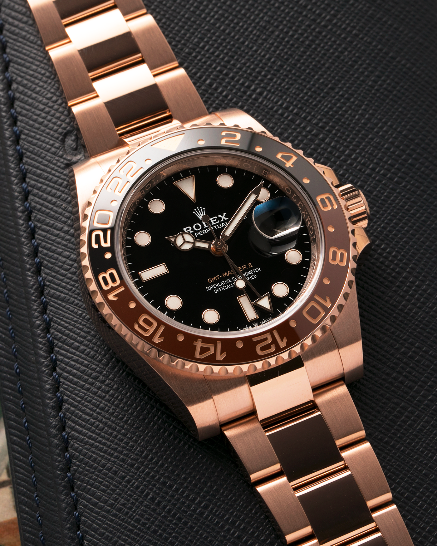 Brand: Rolex
Year: 2022
Model: GMT Master II
Reference Number: 126715CHNR
Material: 18-carat Everose
Movement: Rolex Cal. 3285, Self-Winding
Case Dimensions: 40mm x 12.3mm (Lug-to-Lug 48mm)
Lug Width: 20mm
Bracelet: Rolex Oyster Bracelet in 18-carat Everose with Signed Oysterlock Folding Clasp