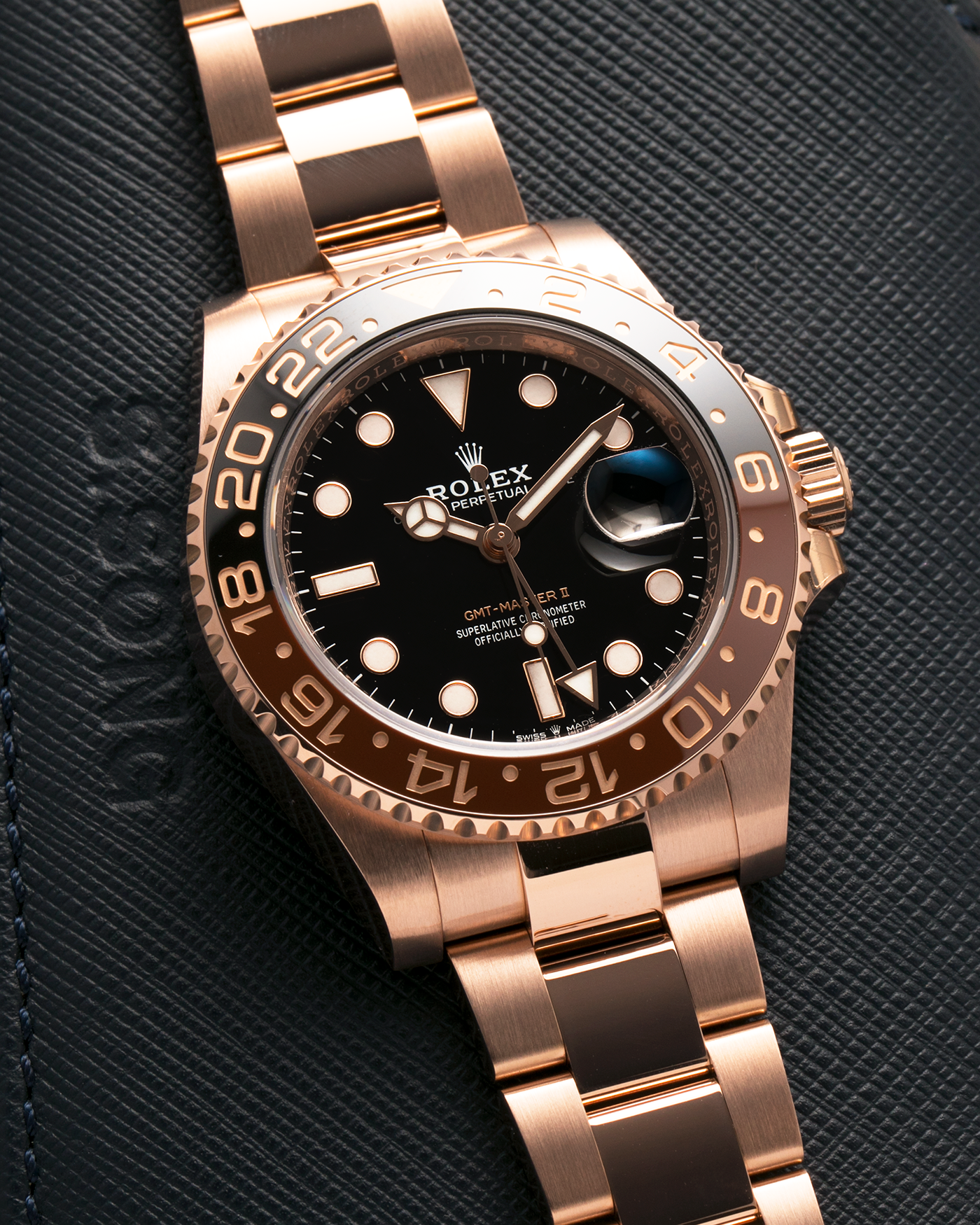 Brand: Rolex
Year: 2022
Model: GMT Master II
Reference Number: 126715CHNR
Material: 18-carat Everose
Movement: Rolex Cal. 3285, Self-Winding
Case Dimensions: 40mm x 12.3mm (Lug-to-Lug 48mm)
Lug Width: 20mm
Bracelet: Rolex Oyster Bracelet in 18-carat Everose with Signed Oysterlock Folding Clasp