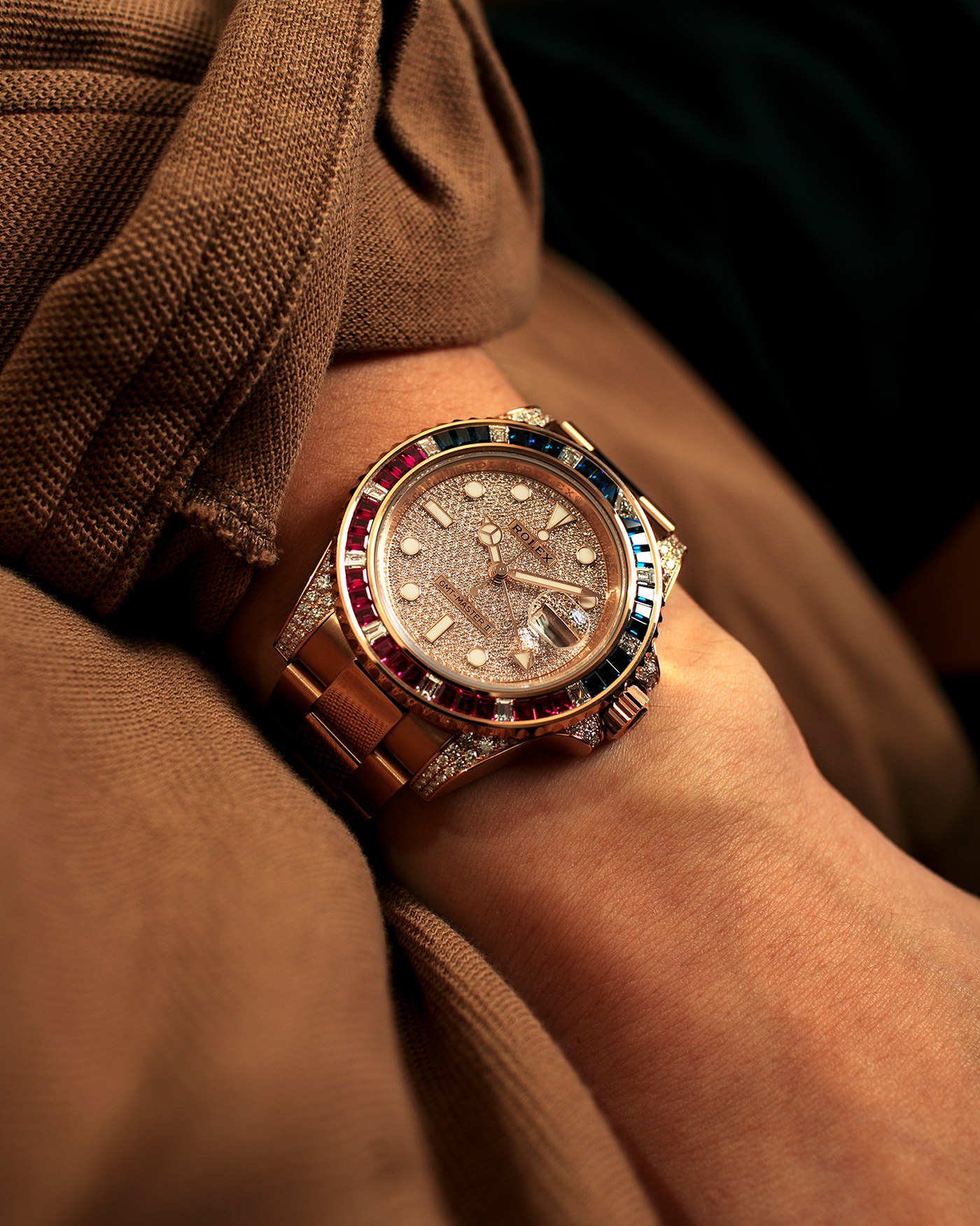 Brand: Rolex
Year: 2020
Model: GMT Master II
Reference Number: 126755SARU
Material: 18-carat Everose, Rubies And Sapphire Bezel, Diamond Pavé Lugs and Crown Guards, Diamond Pavé Dial
Movement: Rolex Cal. 3285, Self-Winding
Case Dimensions: 40mm Diameter 12.3mm Thickness
Lug Width: 20mm
Bracelet: Rolex Oyster Bracelet in 18-carat Everose with Signed Oysterlock Folding Clasp