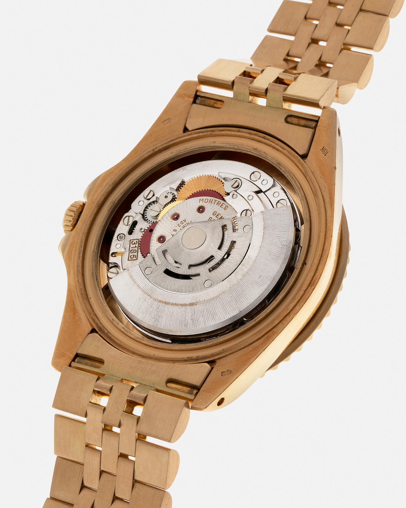 Brand: Rolex
Year: 1994
Model: GMT Master II
Reference Number: 16718
Serial Number: N281XXX
Material: 18-carat Yellow Gold
Movement: Rolex Cal. 3185, Self-Winding
Case Dimensions: 40mm x 12mm (Lug-to-Lug 42.5mm)
Lug Width: 20mm
Bracelet: Rolex 18-carat Yellow Gold 8386 Jubilee Bracelet with 47B Curved End Links