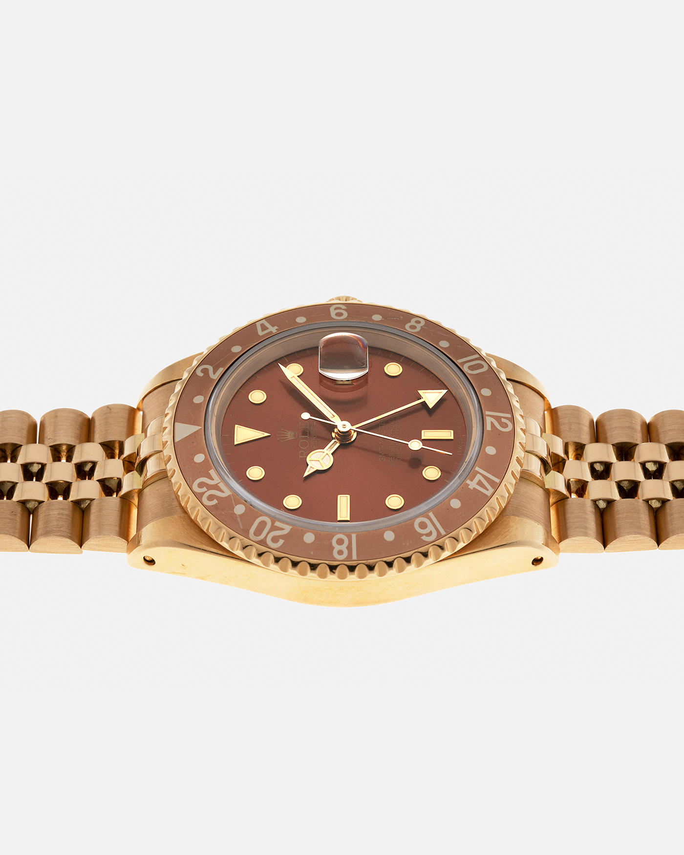 Brand: Rolex
Year: 1994
Model: GMT Master II
Reference Number: 16718
Serial Number: N281XXX
Material: 18-carat Yellow Gold
Movement: Rolex Cal. 3185, Self-Winding
Case Dimensions: 40mm x 12mm (Lug-to-Lug 42.5mm)
Lug Width: 20mm
Bracelet: Rolex 18-carat Yellow Gold 8386 Jubilee Bracelet with 47B Curved End Links