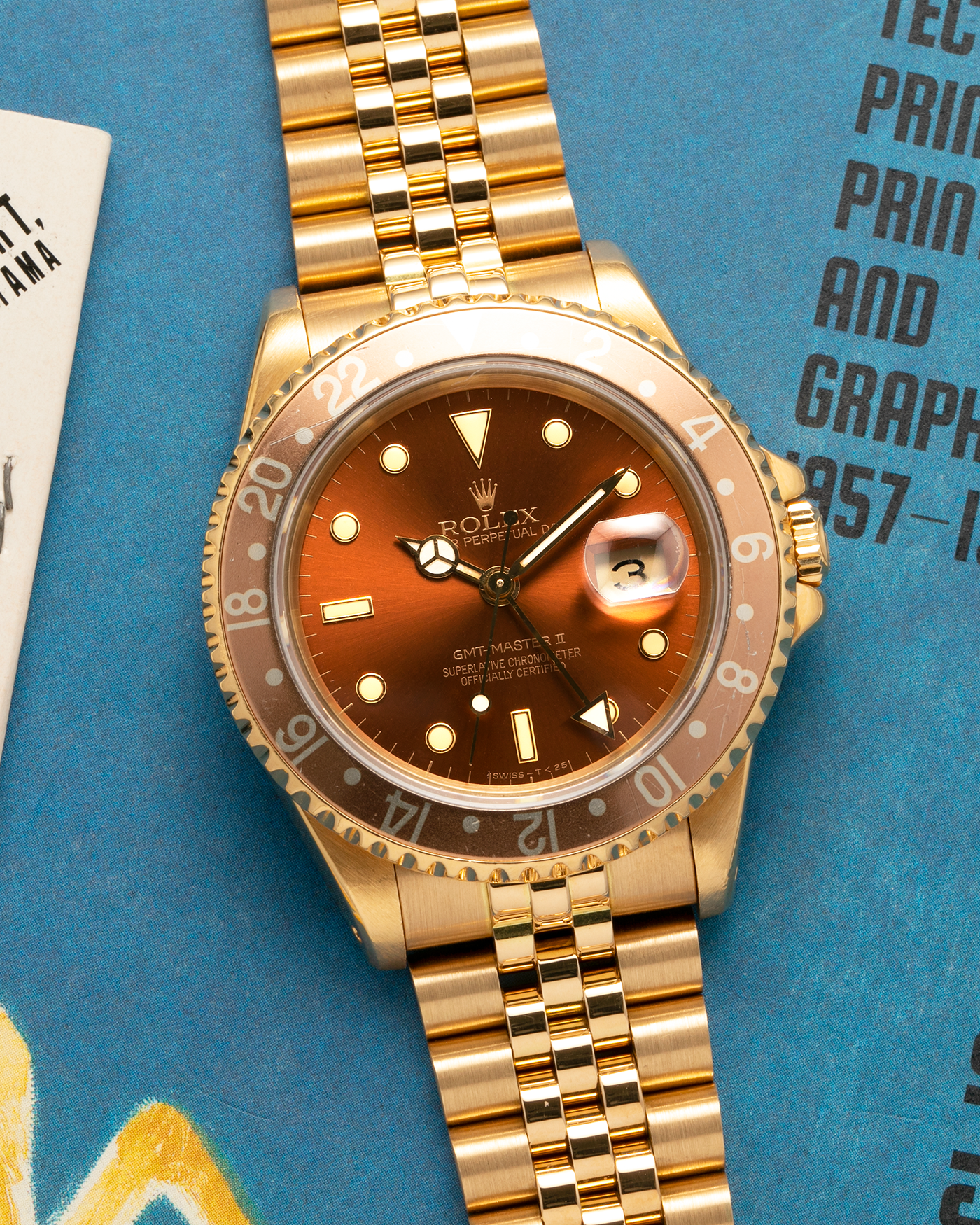 Brand: Rolex
Year: 1994
Model: GMT Master II
Reference Number: 16718
Serial Number: N281XXX
Material: 18-carat Yellow Gold
Movement: Rolex Cal. 3185, Self-Winding
Case Dimensions: 40mm x 12mm (Lug-to-Lug 42.5mm)
Lug Width: 20mm
Bracelet: Rolex 18-carat Yellow Gold 8386 Jubilee Bracelet with 47B Curved End Links