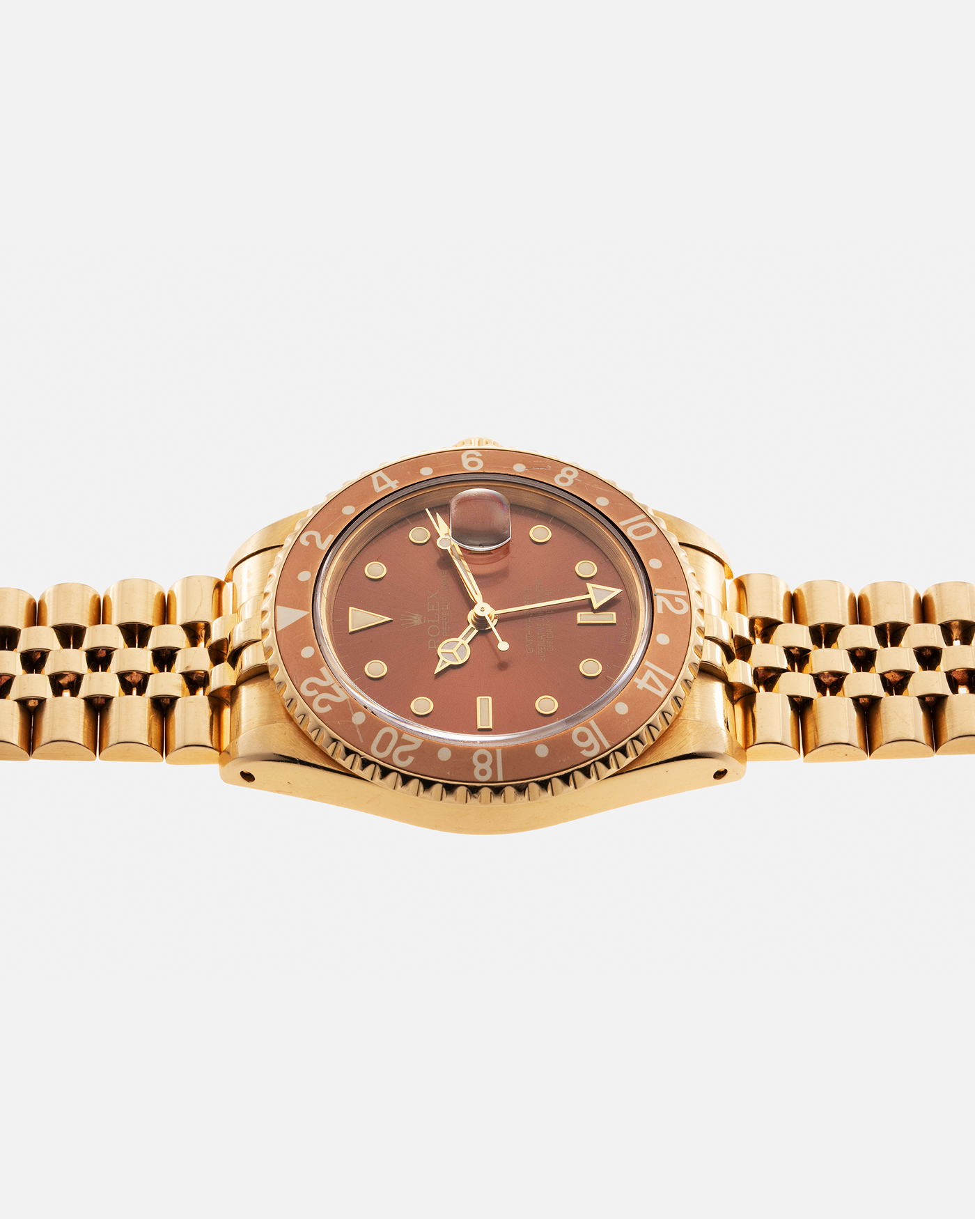 Brand: Rolex Year: 1994 Model: GMT Master II Reference Number: 16718 Serial Number: N281XXX Material: 18-carat Yellow Gold Movement: Rolex Cal. 3185, Self-Winding Case Diameter: 40mm Bracelet: Rolex 18-carat Yellow Gold 8386 Jubilee Bracelet with 47B Curved End Links