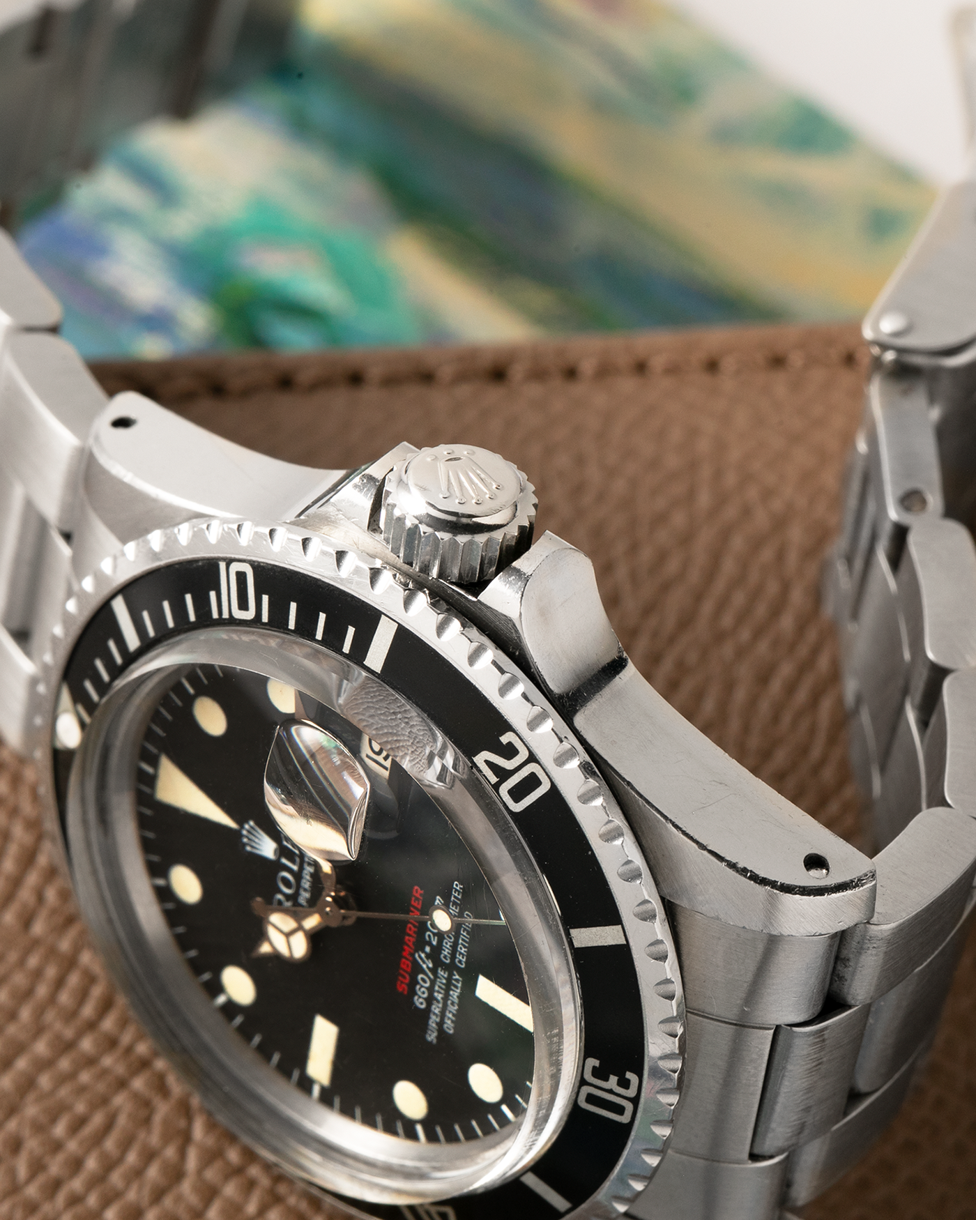 Brand: Rolex
Year: 1976
Model: Submariner
Reference Number: 1680 ‘Red’
Serial Number: 38XXXXX
Material: Stainless Steel
Movement: Rolex Cal. 1575, Self-Winding
Case Dimensions: 40mm
Lug Width: 20mm
Bracelet: Rolex 93150 Oyster Bracelet with Signed Stainless Steel Clasp and XXX End Links