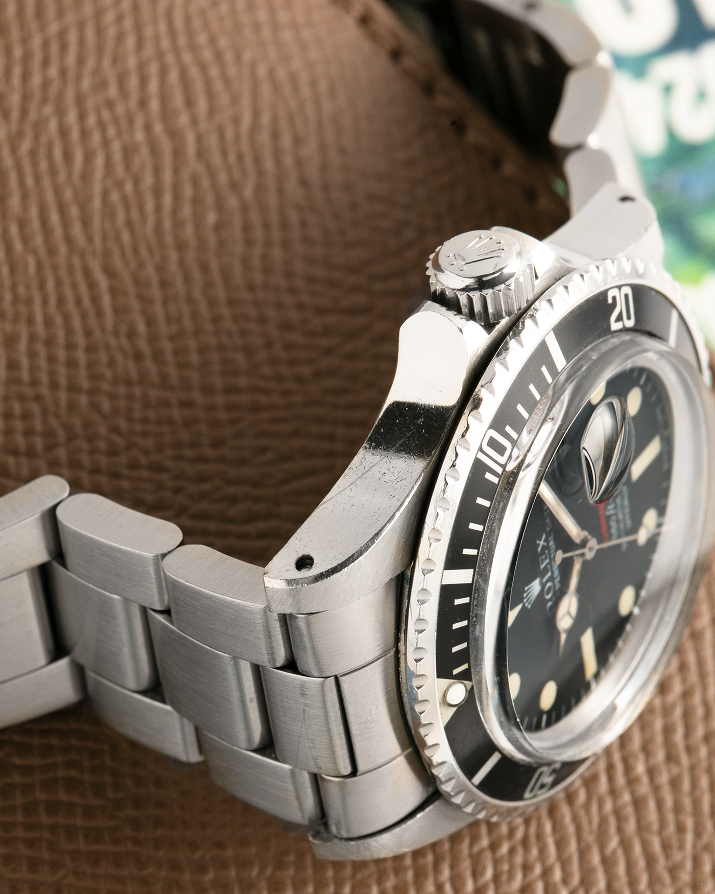 Brand: Rolex
Year: 1976
Model: Submariner
Reference Number: 1680 ‘Red’
Serial Number: 38XXXXX
Material: Stainless Steel
Movement: Rolex Cal. 1575, Self-Winding
Case Dimensions: 40mm
Lug Width: 20mm
Bracelet: Rolex 93150 Oyster Bracelet with Signed Stainless Steel Clasp and XXX End Links
