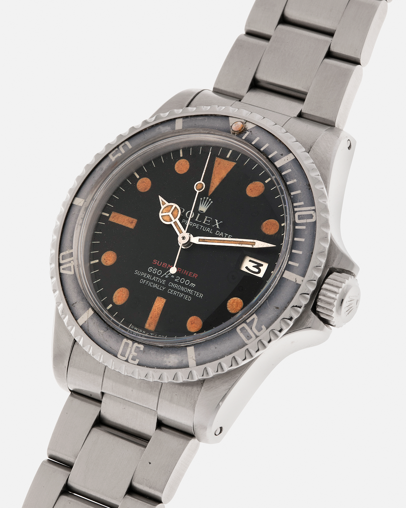 Brand: Rolex
Year: 1972
Model: Submariner
Reference Number: 1680 ‘Red’
Serial Number: 308XXXX
Material: Stainless Steel
Movement: Rolex Cal. 1575, Self-Winding
Case Dimensions: 40mm x 16mm including Domed Crystal (Lug-to-Lug 47.5mm)
Lug Width: 20mm
Bracelet: Rolex 93150 Oyster Bracelet with Signed Stainless Steel Clasp