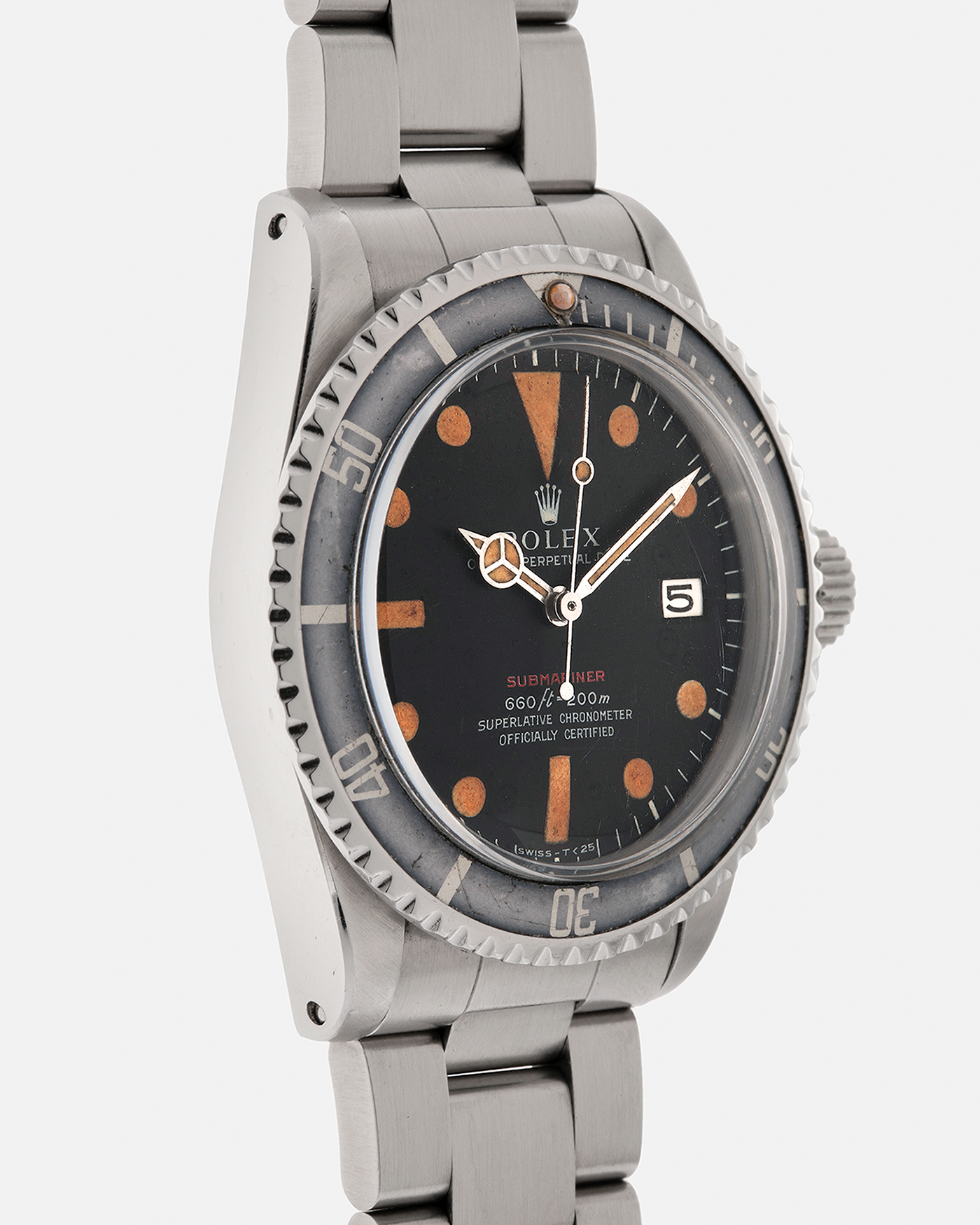 Brand: Rolex
Year: 1972
Model: Submariner
Reference Number: 1680 ‘Red’
Serial Number: 308XXXX
Material: Stainless Steel
Movement: Rolex Cal. 1575, Self-Winding
Case Dimensions: 40mm x 16mm including Domed Crystal (Lug-to-Lug 47.5mm)
Lug Width: 20mm
Bracelet: Rolex 93150 Oyster Bracelet with Signed Stainless Steel Clasp