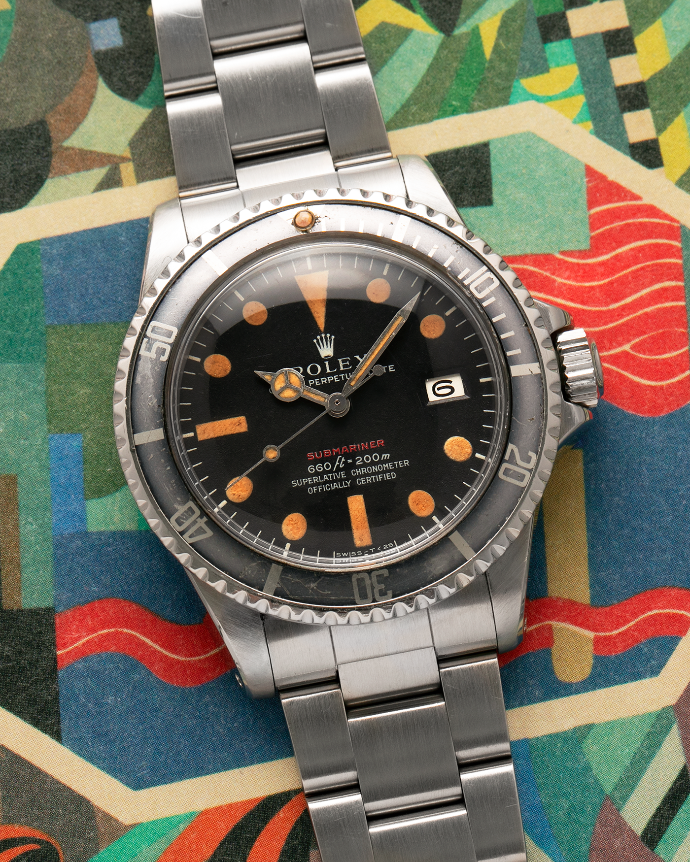 Brand: Rolex
Year: 1972
Model: Submariner
Reference Number: 1680 ‘Red’
Serial Number: 308XXXX
Material: Stainless Steel
Movement: Rolex Cal. 1575, Self-Winding
Case Dimensions: 40mm x 16mm including Domed Crystal (Lug-to-Lug 47.5mm)
Lug Width: 20mm
Bracelet: Rolex 93150 Oyster Bracelet with Signed Stainless Steel Clasp