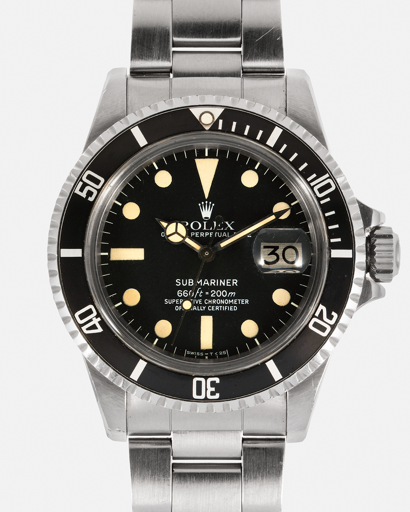 Brand: Rolex Year: 1978 Model: ‘White’ Submariner Reference Number: 1680 Serial Number: 529XXXX Material: Stainless Steel Movement: Rolex Cal. 1575, Self-Winding Case Diameter: 39mm Lug Width: 20mm Bracelet: Rolex Stainless Steel ‘93150’ Oyster bracelet with Signed ‘VB’ Clasp and ‘580’ Curved End Links