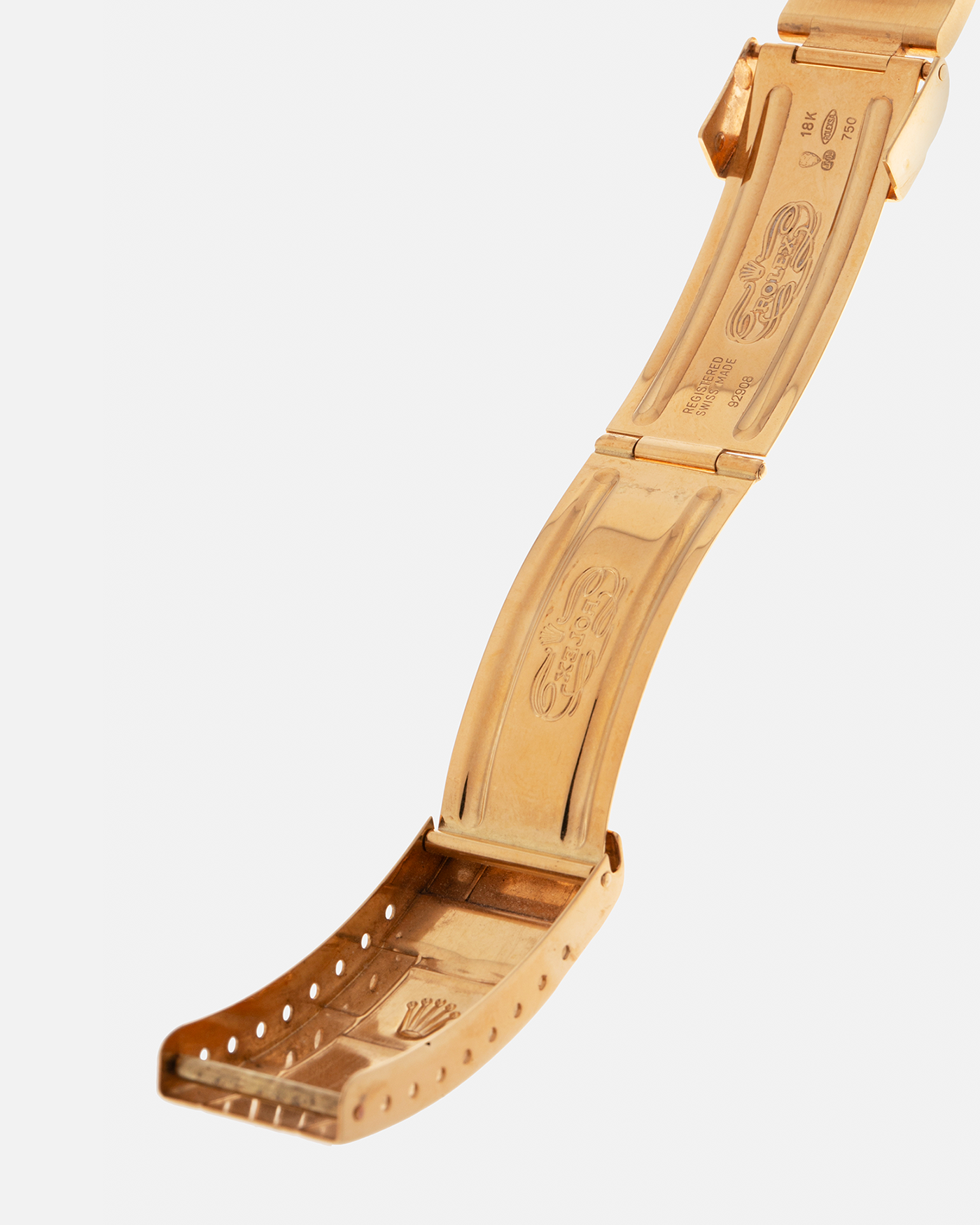 Brand: Rolex
Year: 1984
Model: Submariner
Reference Number: 16808
Serial Number: 838XXXX
Material: 18-carat Yellow Gold
Movement: Rolex Cal. 3035, Self-Winding
Case Dimensions: 40mm x 12.5mm (Lug-to-Lug 47.5mm)
Lug Width: 20mm
Bracelet: Rolex 92908 Oyster Bracelet in 18-carat Yellow Gold With Signed Deployant Clasp with Dive Extension