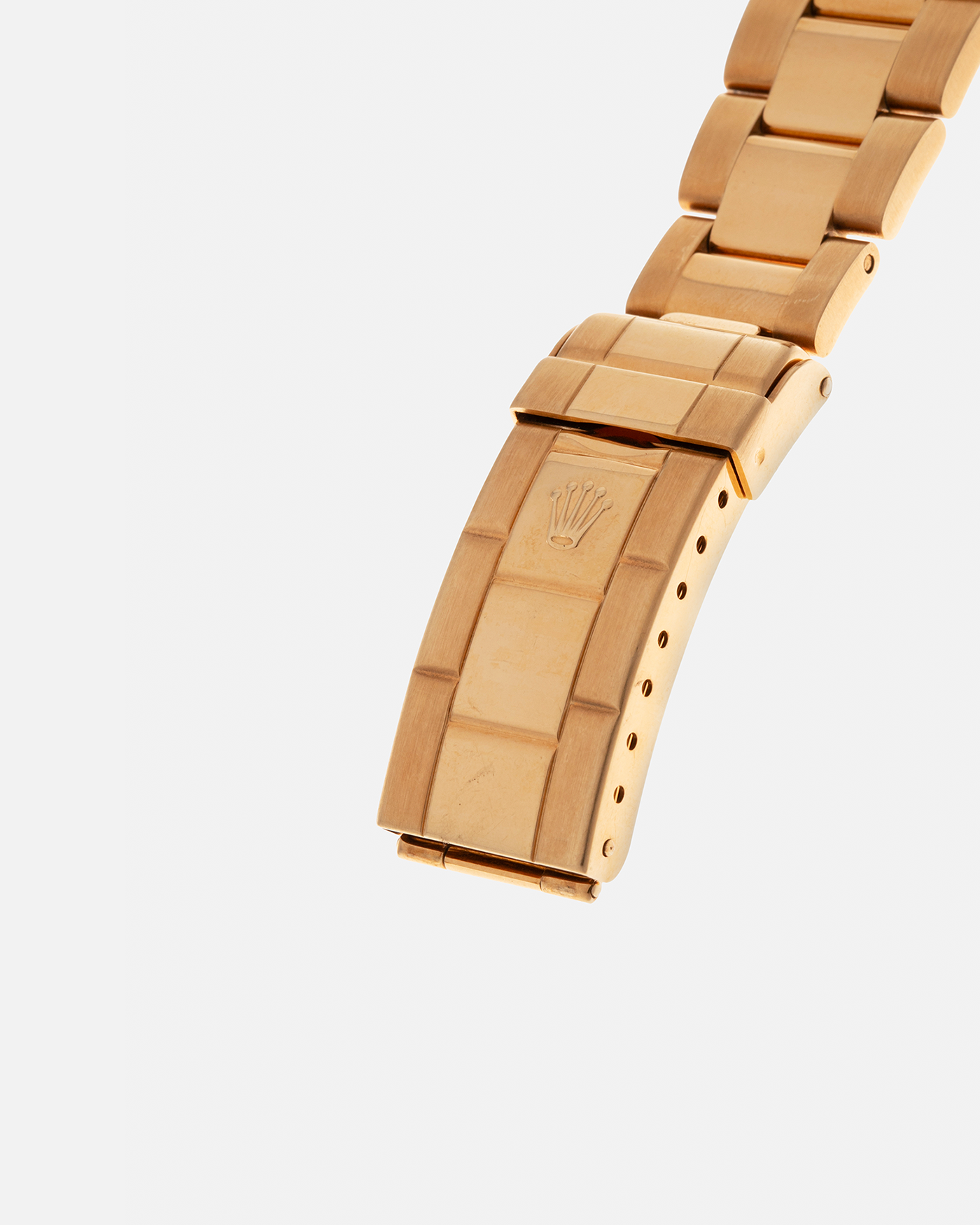 Brand: Rolex
Year: 1984
Model: Submariner
Reference Number: 16808
Serial Number: 838XXXX
Material: 18-carat Yellow Gold
Movement: Rolex Cal. 3035, Self-Winding
Case Dimensions: 40mm x 12.5mm (Lug-to-Lug 47.5mm)
Lug Width: 20mm
Bracelet: Rolex 92908 Oyster Bracelet in 18-carat Yellow Gold With Signed Deployant Clasp with Dive Extension