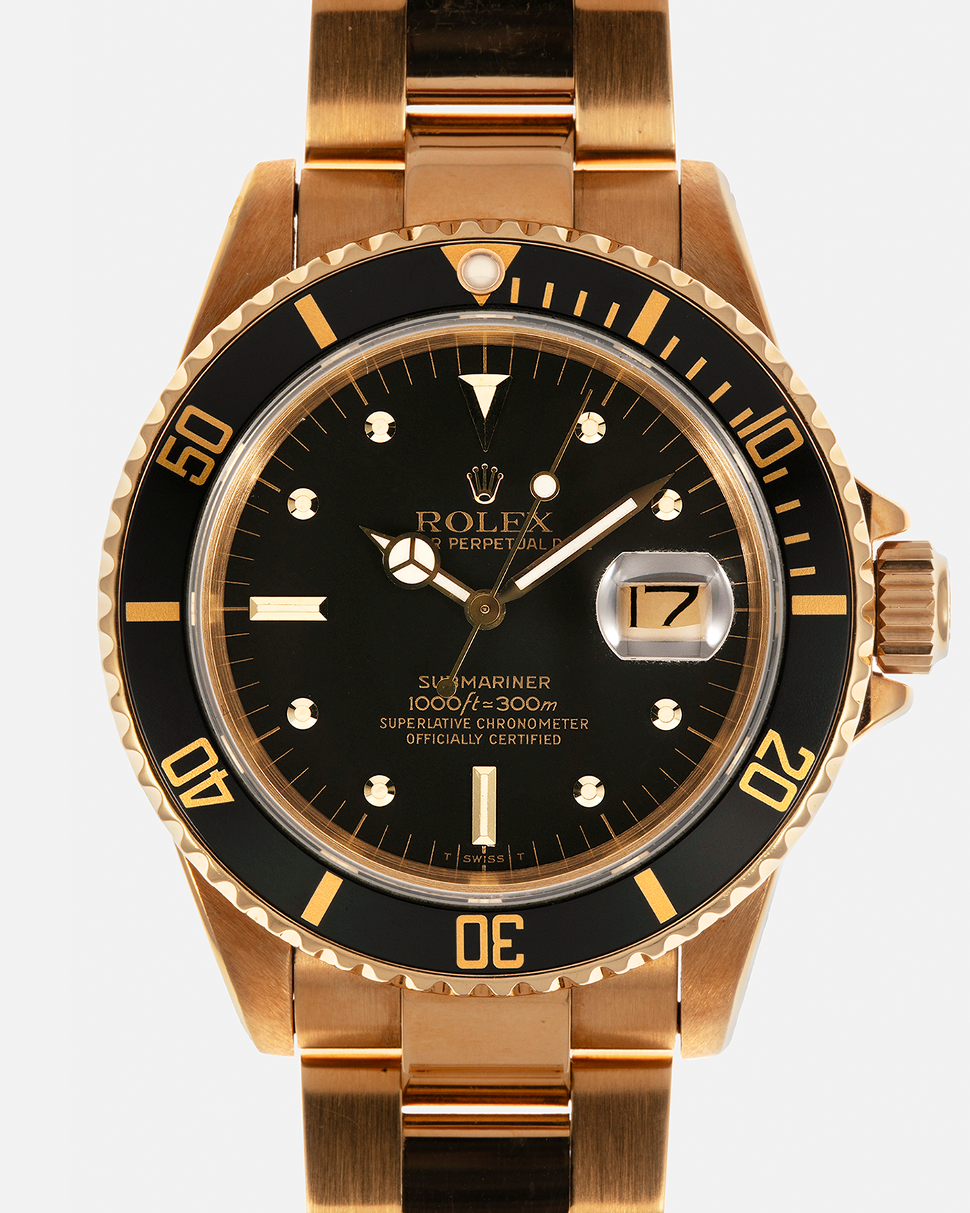 Brand: Rolex
Year: 1984
Model: Submariner
Reference Number: 16808
Serial Number: 838XXXX
Material: 18-carat Yellow Gold
Movement: Rolex Cal. 3035, Self-Winding
Case Dimensions: 40mm x 12.5mm (Lug-to-Lug 47.5mm)
Lug Width: 20mm
Bracelet: Rolex 92908 Oyster Bracelet in 18-carat Yellow Gold With Signed Deployant Clasp with Dive Extension