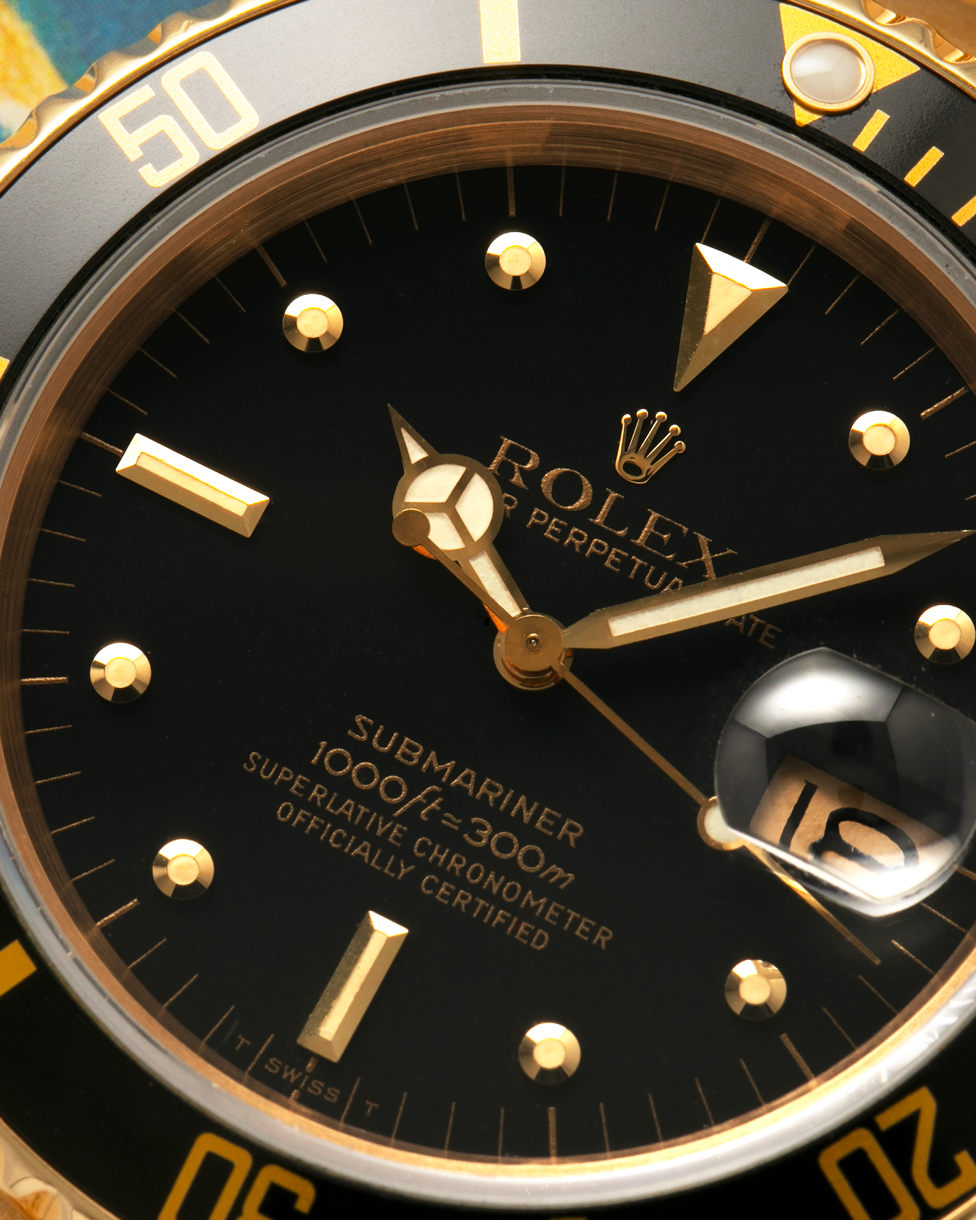 Brand: Rolex
Year: 1984
Model: Submariner
Reference Number: 16808
Serial Number: 838XXXX
Material: 18-carat Yellow Gold
Movement: Rolex Cal. 3035, Self-Winding
Case Dimensions: 40mm x 12.5mm (Lug-to-Lug 47.5mm)
Lug Width: 20mm
Bracelet: Rolex 92908 Oyster Bracelet in 18-carat Yellow Gold With Signed Deployant Clasp with Dive Extension