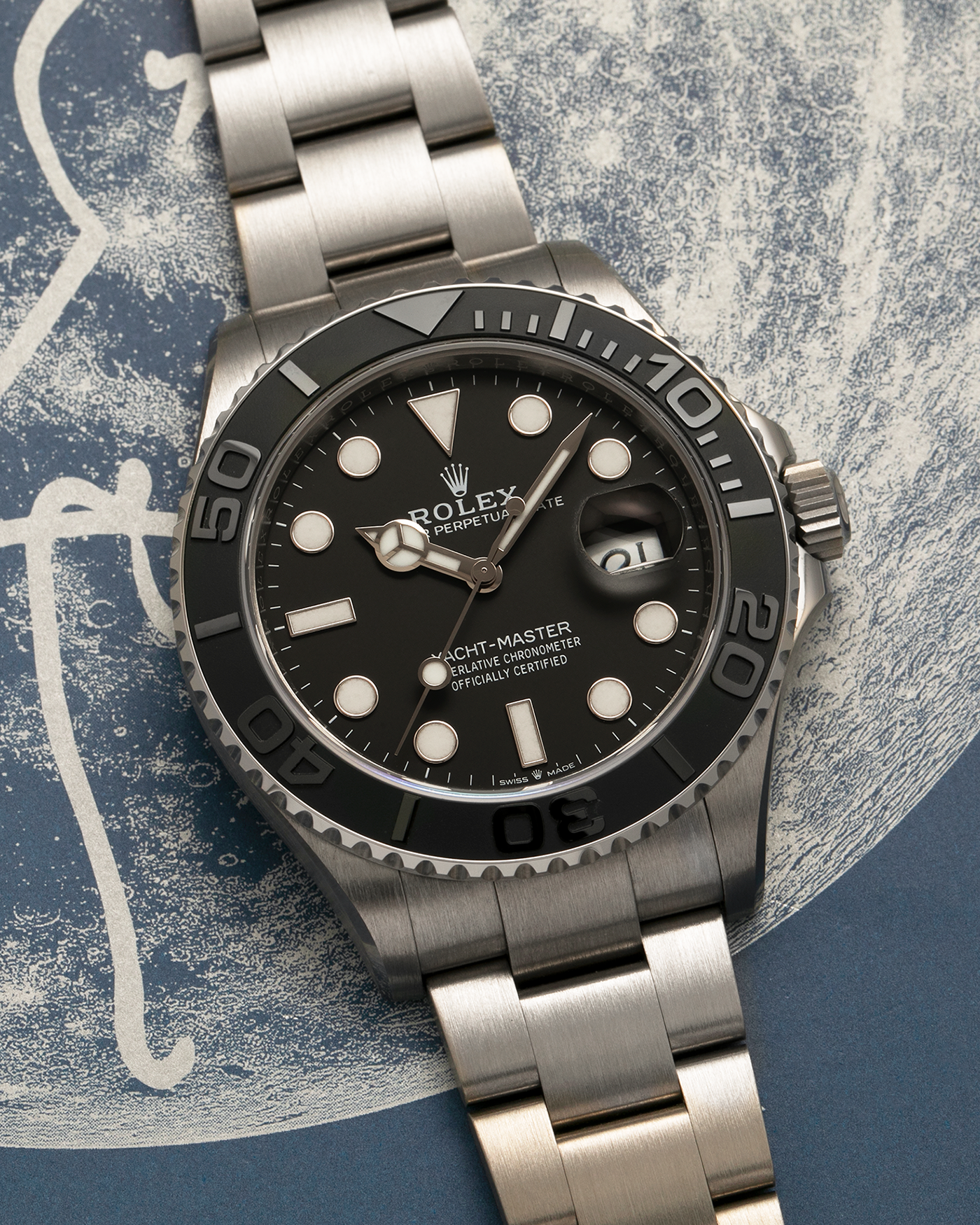 Brand: Rolex
Year: 2025
Model: Yacht-Master 42
Reference Number: 226627
Material: RLX Titanium (Grade 5 Alloy)
Movement: Rolex Cal. 3235, Self-Winding
Case Dimensions: 42mm x 11.6mm (Lug-to-Lug 50.3mm)
Lug Width: 21mm
Bracelet: Rolex RLX Titanium Oyster Bracelet with Signed Oysterlock Clasp and Easylink Extension