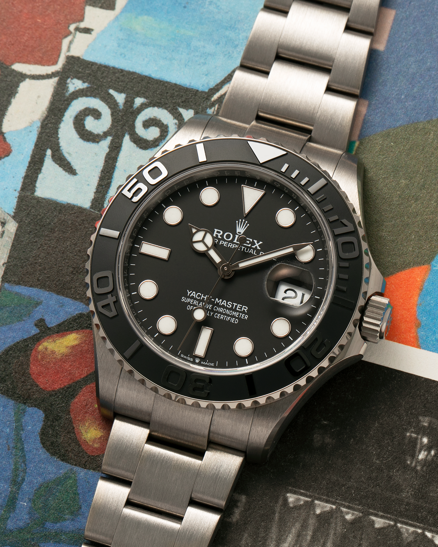 Brand: Rolex
Year: 2025
Model: Yacht-Master 42
Reference Number: 226627
Material: RLX Titanium (Grade 5 Alloy)
Movement: Rolex Cal. 3235, Self-Winding
Case Dimensions: 42mm x 11.6mm (Lug-to-Lug 50.3mm)
Lug Width: 21mm
Bracelet: Rolex RLX Titanium Oyster Bracelet with Signed Oysterlock Clasp and Easylink Extension