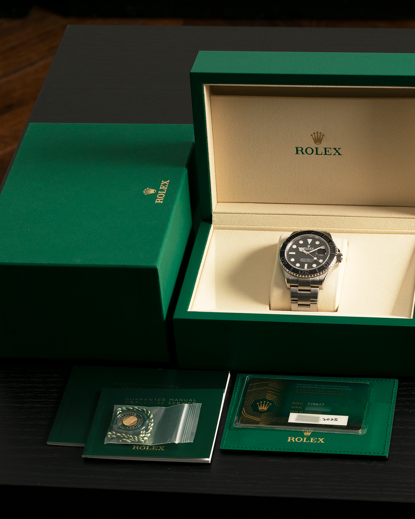 Brand: Rolex
Year: 2025
Model: Yacht-Master 42
Reference Number: 226627
Material: RLX Titanium (Grade 5 Alloy)
Movement: Rolex Cal. 3235, Self-Winding
Case Dimensions: 42mm x 11.6mm (Lug-to-Lug 50.3mm)
Lug Width: 21mm
Bracelet: Rolex RLX Titanium Oyster Bracelet with Signed Oysterlock Clasp and Easylink Extension