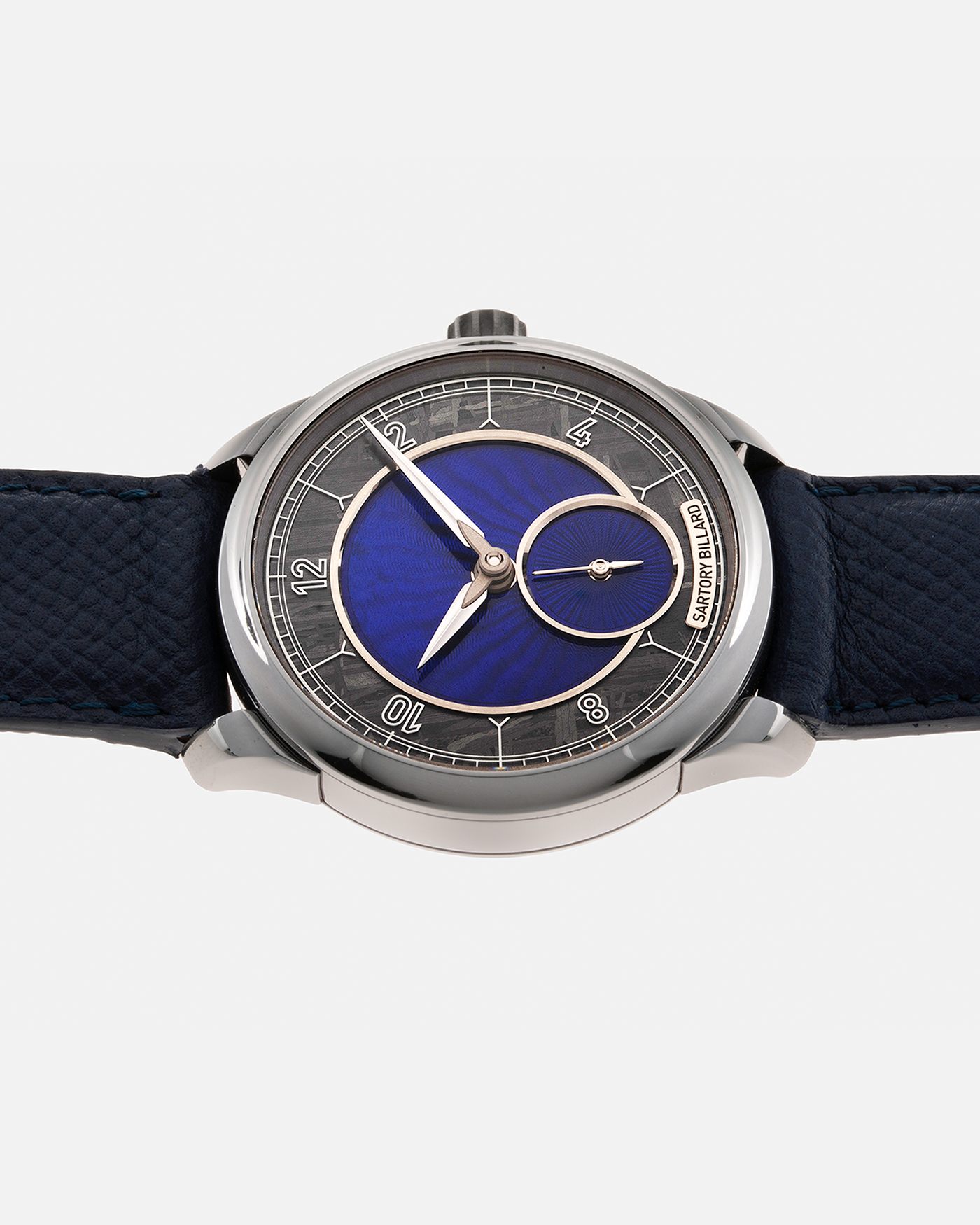 Brand: Sartory Billard Year: 2023 Model: SB05 Material: Tantalum Case, Meteorite Chapter Ring Movement: La Joux-Perret Cal. 7380, Manual-Winding  Case Diameter: 38.5mm Strap: Sartory Billard Dark Blue Textured Calf Leather Strap with Sartory Billard Signature Tang Buckle, with an additional Sartory Billard Veal Hermeline Strap and a Calf Suede Strap, both additional straps with Sartory Billard Signature Tang Buckles