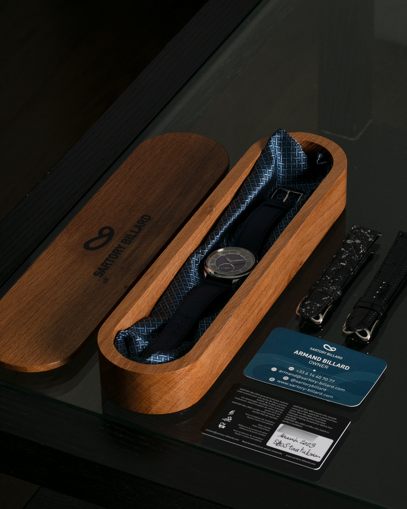 Brand: Sartory Billard Year: 2023 Model: SB05 Material: Tantalum Case, Meteorite Chapter Ring Movement: La Joux-Perret Cal. 7380, Manual-Winding  Case Diameter: 38.5mm Strap: Sartory Billard Dark Blue Textured Calf Leather Strap with Sartory Billard Signature Tang Buckle, with an additional Sartory Billard Veal Hermeline Strap and a Calf Suede Strap, both additional straps with Sartory Billard Signature Tang Buckles