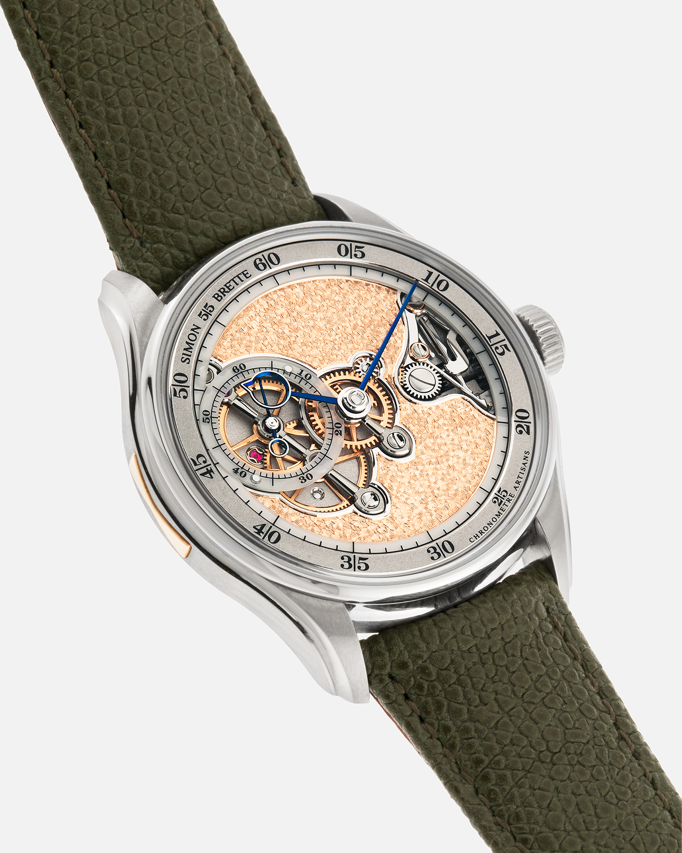 Brand: Simon Brette
Year: 2025
Model: Chronometre Artisans
Reference Number: 64.237.XXX
Material: Grade 5 Titanium
Movement: Simon Brette In-House, Manually Wound Cal. SBCA
Case Dimensions: 39mm Diameter 10.5mm Thickness
Lug Width: 20mm
Strap: Simon Brette Green Calf Leather Strap with Signed Grade 5 Titanium Tang Buckle