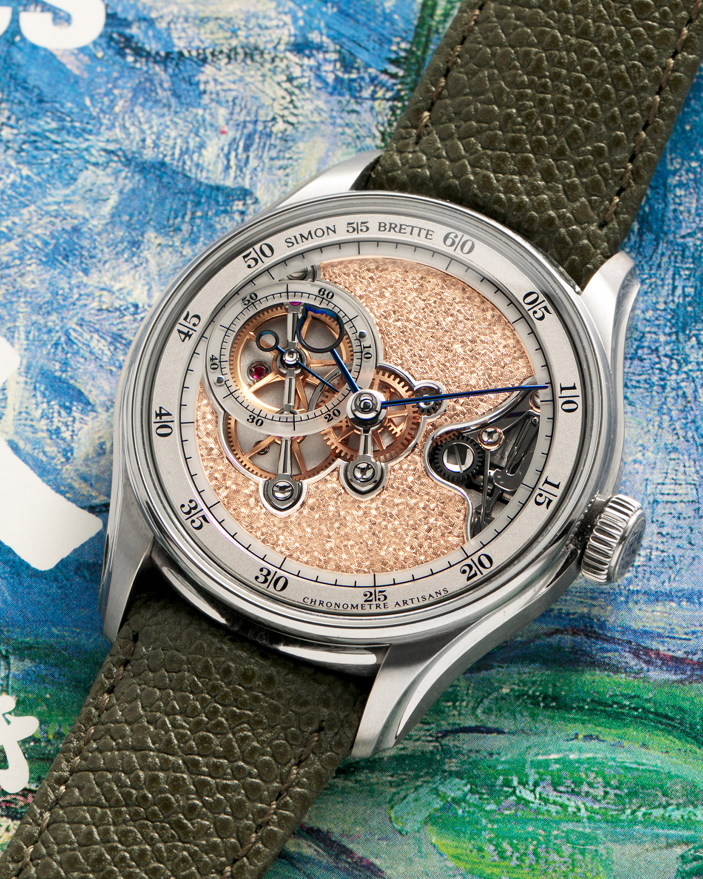 Brand: Simon Brette
Year: 2025
Model: Chronometre Artisans
Reference Number: 64.237.XXX
Material: Grade 5 Titanium
Movement: Simon Brette In-House, Manually Wound Cal. SBCA
Case Dimensions: 39mm Diameter 10.5mm Thickness
Lug Width: 20mm
Strap: Simon Brette Green Calf Leather Strap with Signed Grade 5 Titanium Tang Buckle