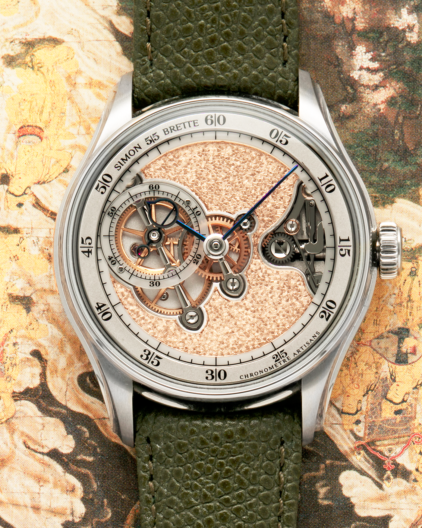 Brand: Simon Brette
Year: 2025
Model: Chronometre Artisans
Reference Number: 64.237.XXX
Material: Grade 5 Titanium
Movement: Simon Brette In-House, Manually Wound Cal. SBCA
Case Dimensions: 39mm Diameter 10.5mm Thickness
Lug Width: 20mm
Strap: Simon Brette Green Calf Leather Strap with Signed Grade 5 Titanium Tang Buckle