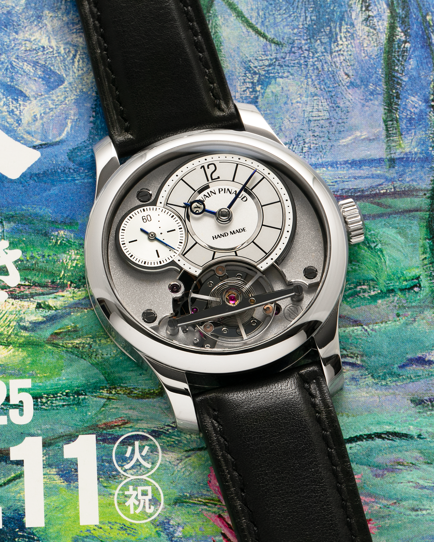 Brand: Sylvain Pinaud
Year: 2025
Model: Origine
Material: Stainless Steel
Movement: Sylvain Pinaud In-House, Manually Wound Mechanical Movement
Case Dimensions: 40mm Diameter 11mm Thickness
Strap: Sylvain Pinaud Black Leather Strap with Stainless Steel Sylvain Pinaud Tang Buckle