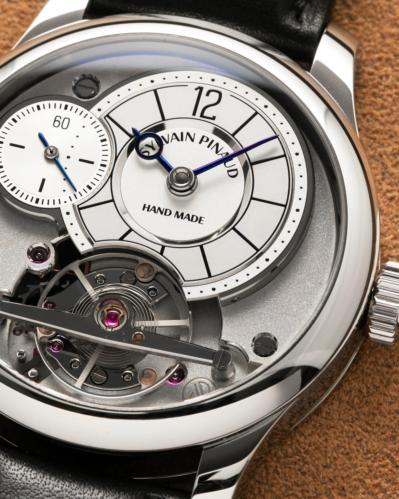 Brand: Sylvain Pinaud
Year: 2025
Model: Origine
Material: Stainless Steel
Movement: Sylvain Pinaud In-House, Manually Wound Mechanical Movement
Case Dimensions: 40mm Diameter 11mm Thickness
Strap: Sylvain Pinaud Black Leather Strap with Stainless Steel Sylvain Pinaud Tang Buckle