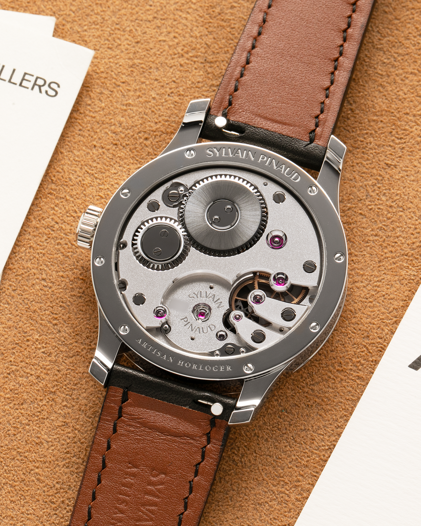 Brand: Sylvain Pinaud
Year: 2025
Model: Origine
Material: Stainless Steel
Movement: Sylvain Pinaud In-House, Manually Wound Mechanical Movement
Case Dimensions: 40mm Diameter 11mm Thickness
Strap: Sylvain Pinaud Black Leather Strap with Stainless Steel Sylvain Pinaud Tang Buckle