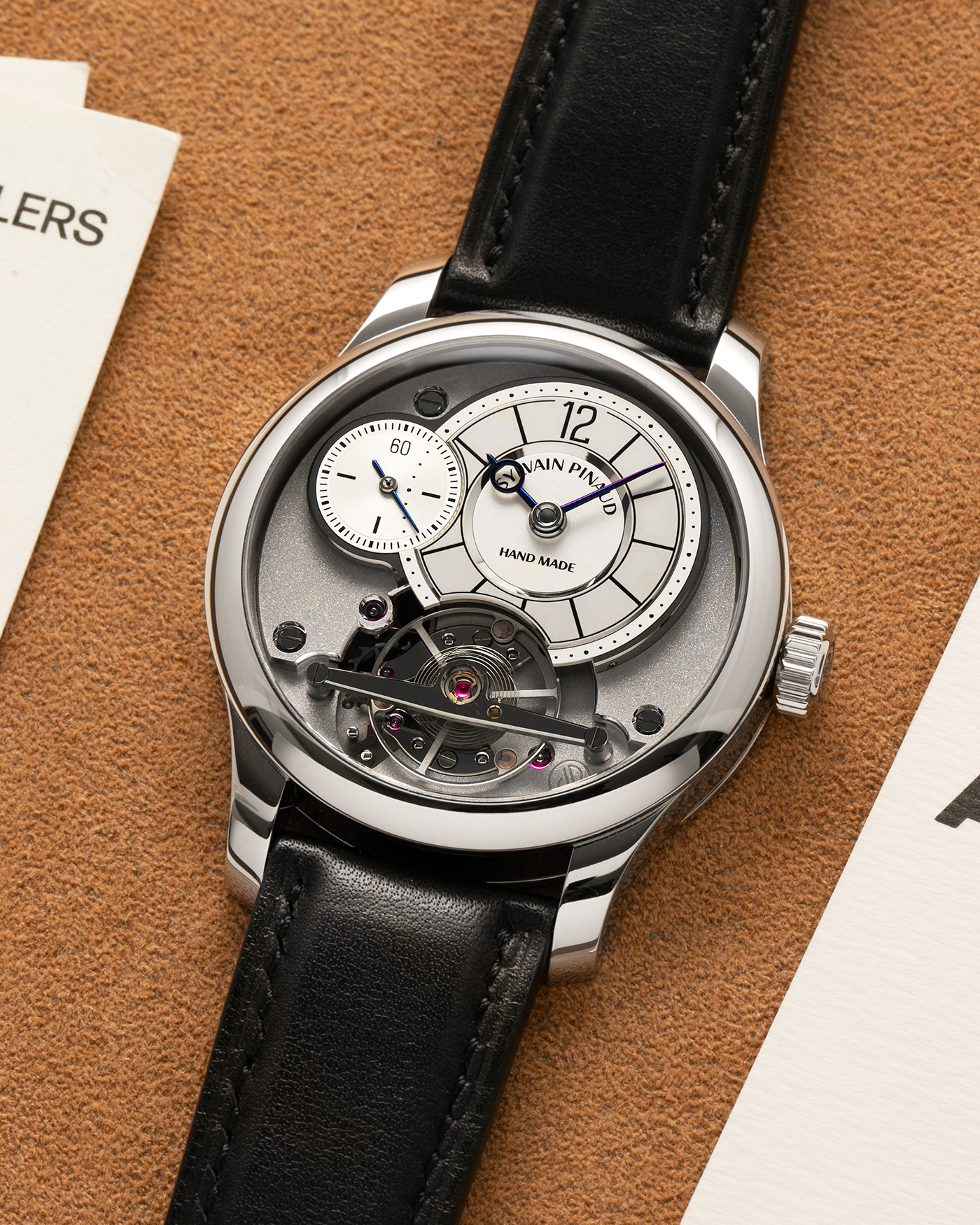 Brand: Sylvain Pinaud
Year: 2025
Model: Origine
Material: Stainless Steel
Movement: Sylvain Pinaud In-House, Manually Wound Mechanical Movement
Case Dimensions: 40mm Diameter 11mm Thickness
Strap: Sylvain Pinaud Black Leather Strap with Stainless Steel Sylvain Pinaud Tang Buckle
