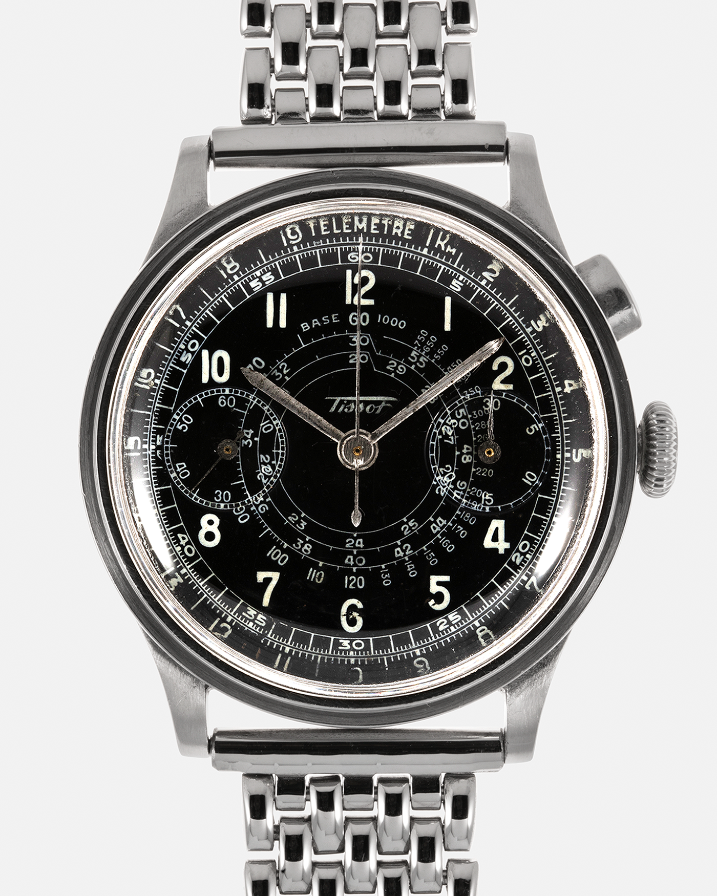 Brand: Tissot Year: 1940’s Model: 15TL Monopusher Chronograph Material: Steel Movement: Tissot Cal. 33.3, Manual-Winding Case Diameter: 38mm Lug Width: 18mm Bracelet: Private Eyes Stainless Steel Beads of Rice Bracelet