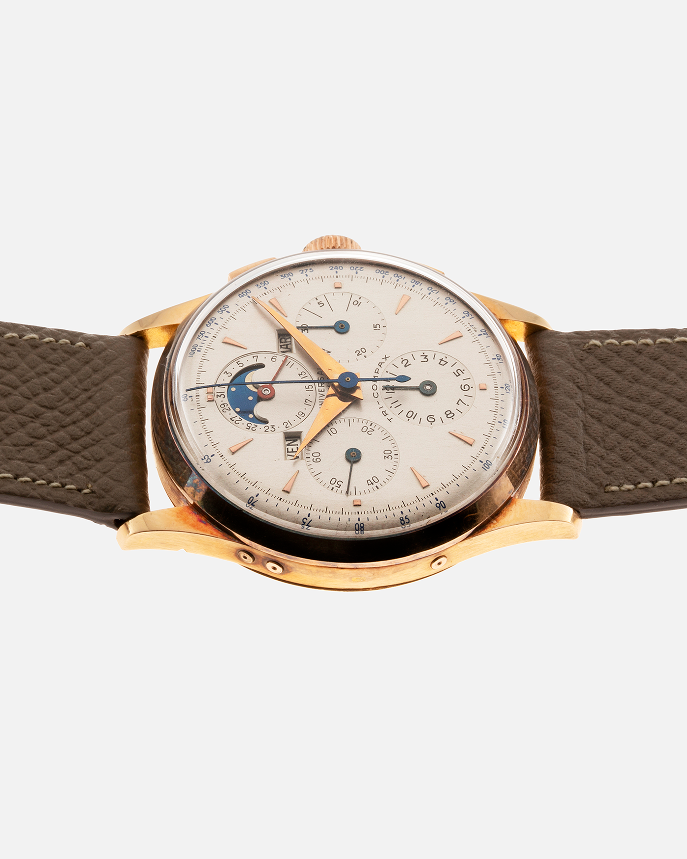 Brand: Universal Genève Year: 1950’s Reference Number: 12295 Material: 18-carat Yellow Gold Movement: Cal. 481, Manual-Winding Case Diameter: 35mm Strap: Nostime Taupe Textured Calf Strap with Generic Stainless Steel Tang Buckle