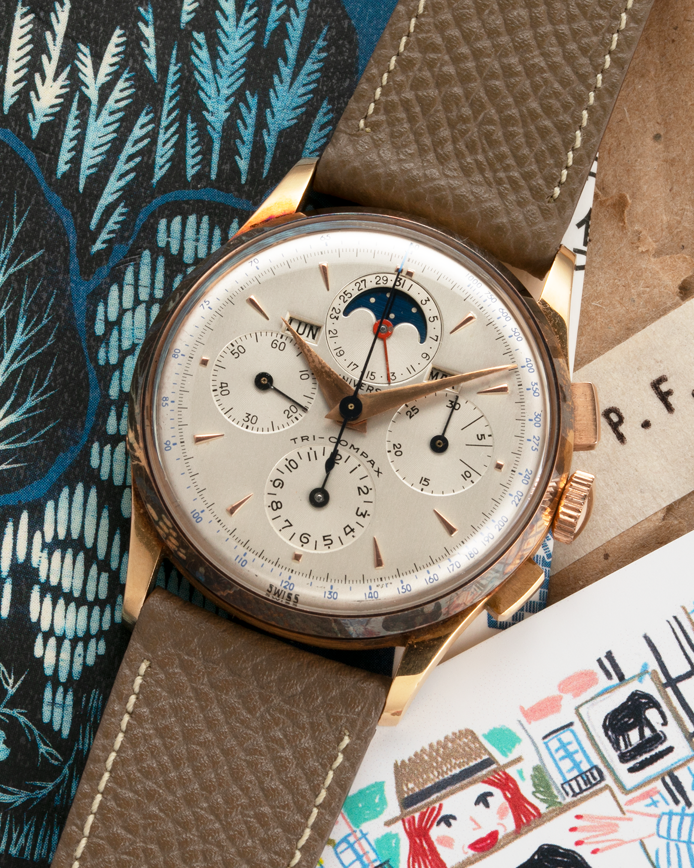 Brand: Universal Genève Year: 1950’s Reference Number: 12295 Material: 18-carat Yellow Gold Movement: Cal. 481, Manual-Winding Case Diameter: 35mm Strap: Nostime Taupe Textured Calf Strap with Generic Stainless Steel Tang Buckle