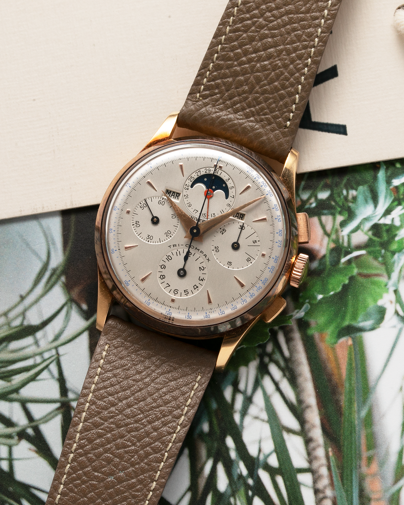 Brand: Universal Genève Year: 1950’s Reference Number: 12295 Material: 18-carat Yellow Gold Movement: Cal. 481, Manual-Winding Case Diameter: 35mm Strap: Nostime Taupe Textured Calf Strap with Generic Stainless Steel Tang Buckle