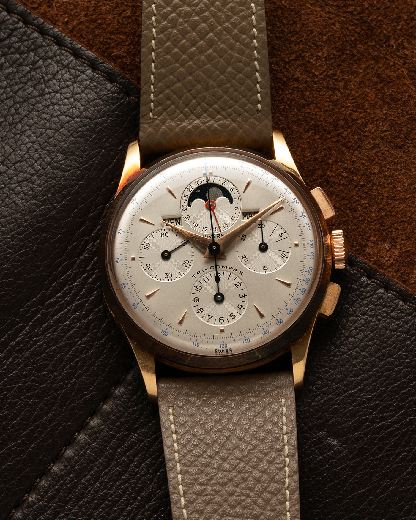 Brand: Universal Genève Year: 1950’s Reference Number: 12295 Material: 18-carat Yellow Gold Movement: Universal Genève Cal. 481, Manual-Winding Case Diameter: 35mm Lug Width: 20mm Strap: Nostime Taupe Textured Calf Strap with Generic Stainless Steel Tang Buckle