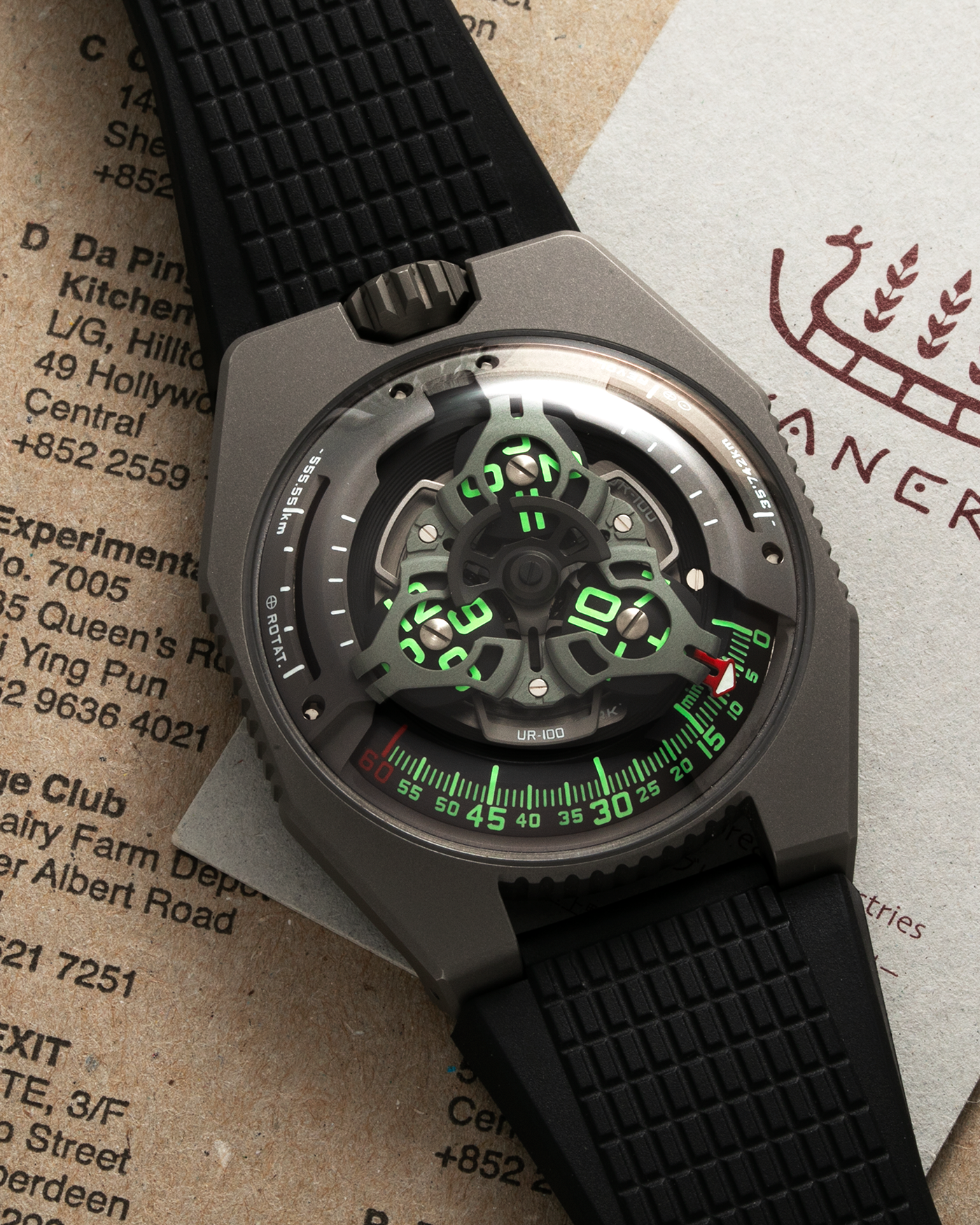Brand: Urwerk Year: 2020 Model: UR100 GunMetal, Limited Edition of 25 Pieces Material: Titanium and Stainless-Steel Case with GunMetal PVD-Coating, ARCAP Alloy (Blend of Nickle, Copper, Cobalt and Zinc) Movement Carousell System Movement: Urwerk Cal. 12.01, Self-Winding Case Dimensions: 41mm x 14mm Strap: Urwerk Proprietary Black Rubber Strap with Signed Deployant Buckle, with additional Urwerk Proprietary Black Textile Strap