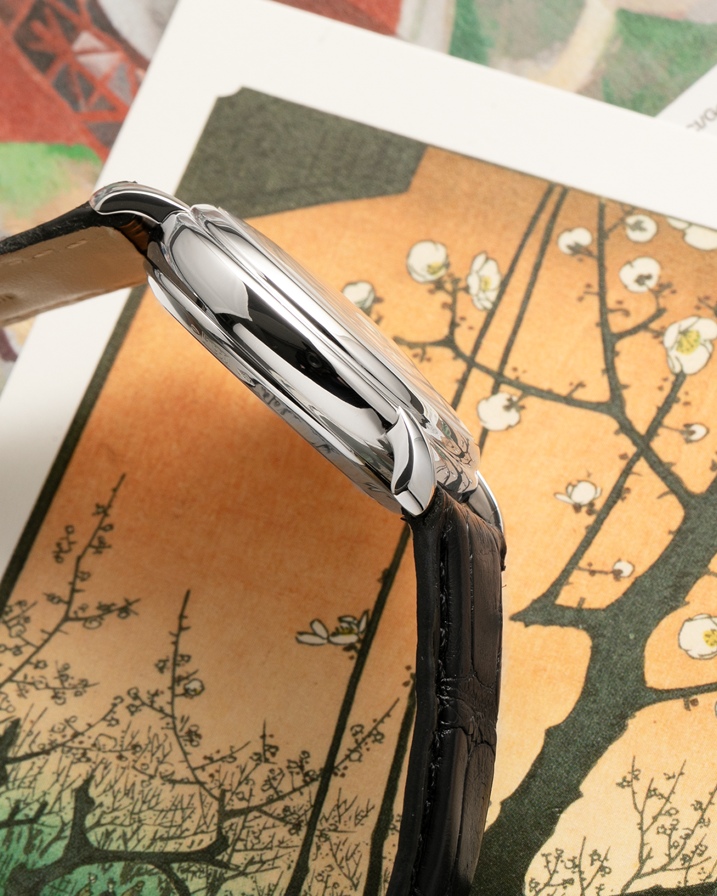 Brand: Vacheron Constantin
Year: 1990’s
Model: Les Historiques Chronograph
Reference: 47101
Material: Platinum 950
Movement: Vacheron Constantin Cal. 1140 (Lémania 2310 Based), Manual-Winding
Case Dimensions: 36mm Diameter 10.6mm Thickness
Lug Width: 18mm
Straps: Vacheron Constantin Black Alligator Strap with Platinum Vacheron Constantin Tang Buckle