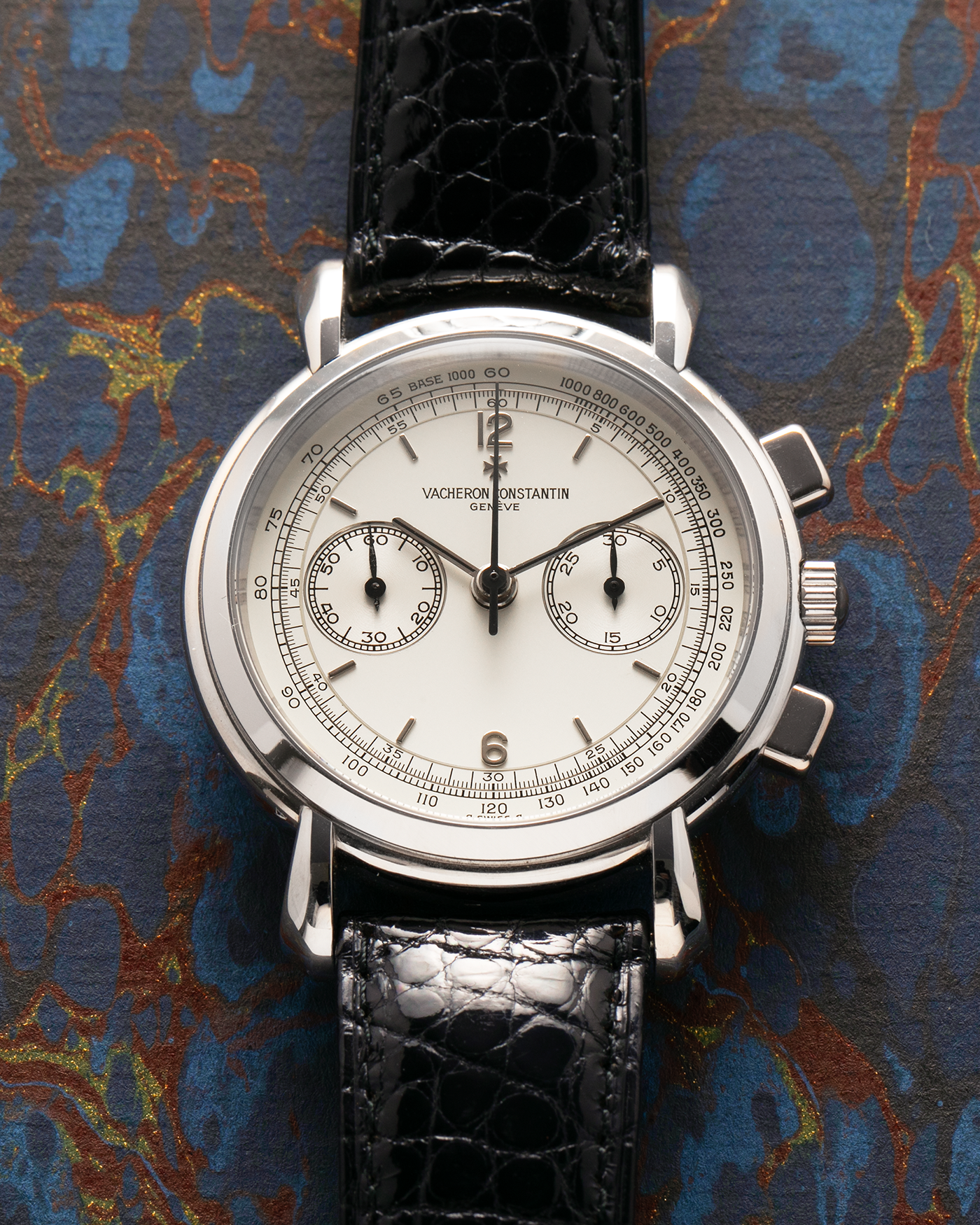 Brand: Vacheron Constantin
Year: 1995
Model: Les Historiques Chronograph
Reference: 47101
Material: Platinum 950
Movement: Vacheron Constantin Cal. 1140 (Lémania 2310 Based), Manual-Winding
Case Dimensions: 36mm Diameter 10.6mm Thickness
Lug Width: 18mm
Straps: Vacheron Constantin Black Alligator Strap with Signed Platinum Tang Buckle