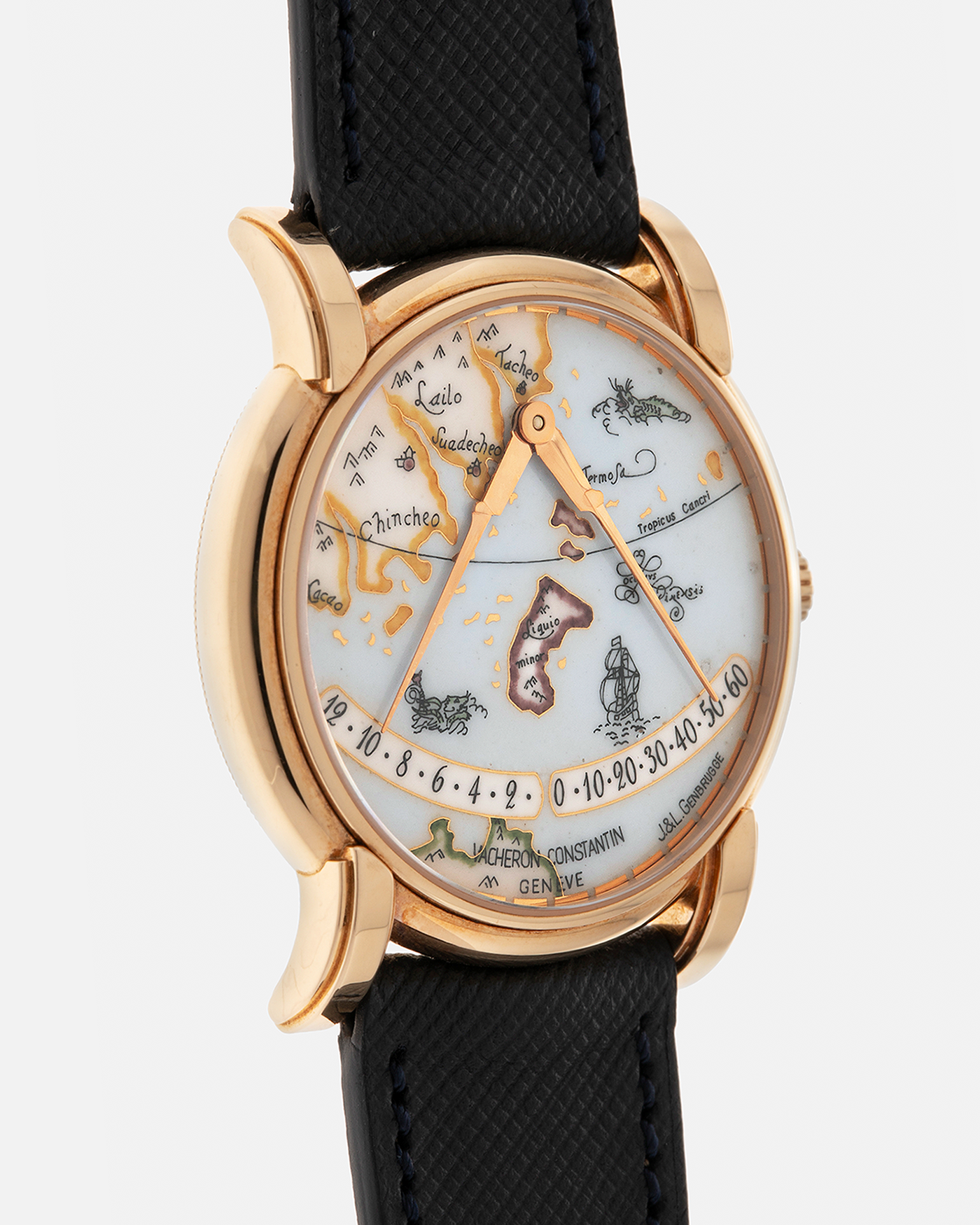 Brand: Vacheron Constantin
Year: 1998
Model: Mercator
Reference Number: 43050
Material: 18-carat Rose Gold Case, Champlevé Enamel Dial
Movement: Vacheron Constantin Cal. 1120/2 (Heavily-Modified Jaeger LeCoultre Cal. 920 Ébauche), Self-Winding
Case Dimensions: 36mm x 9mm (Lug-to-Lug 41mm)
Lug Width: 20mm
Strap: Molequin Dark Navy Textured Calf Leather Strap with Signed 18-carat Yellow Gold Deployant Buckle, extra Vacheron Constantin Black Alligator Leather Strap (Used)