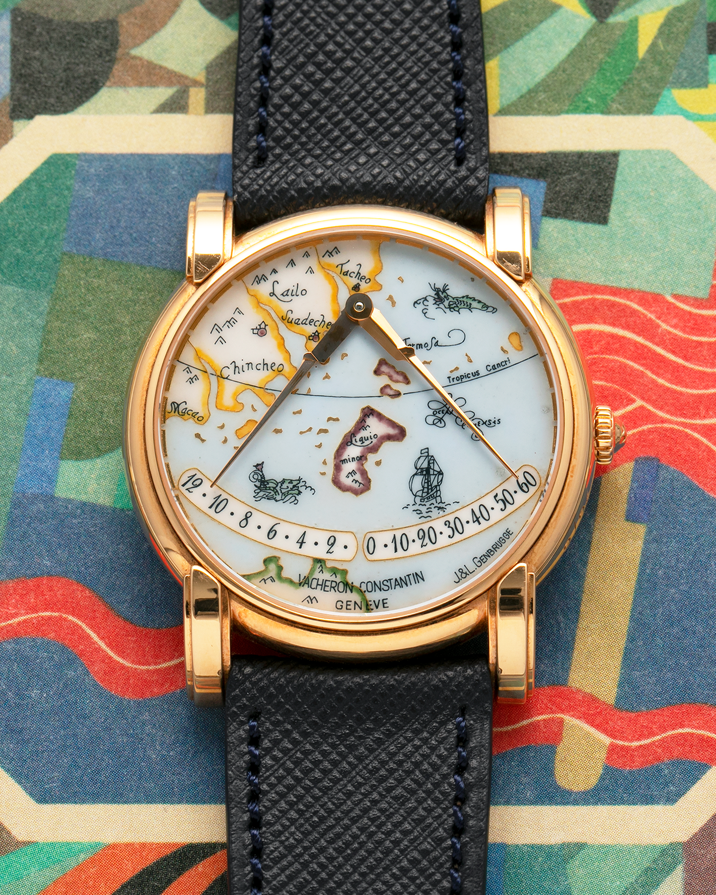 Brand: Vacheron Constantin
Year: 1998
Model: Mercator
Reference Number: 43050
Material: 18-carat Rose Gold Case, Champlevé Enamel Dial
Movement: Vacheron Constantin Cal. 1120/2 (Heavily-Modified Jaeger LeCoultre Cal. 920 Ébauche), Self-Winding
Case Dimensions: 36mm x 9mm (Lug-to-Lug 41mm)
Lug Width: 20mm
Strap: Molequin Dark Navy Textured Calf Leather Strap with Signed 18-carat Yellow Gold Deployant Buckle, extra Vacheron Constantin Black Alligator Leather Strap (Used)