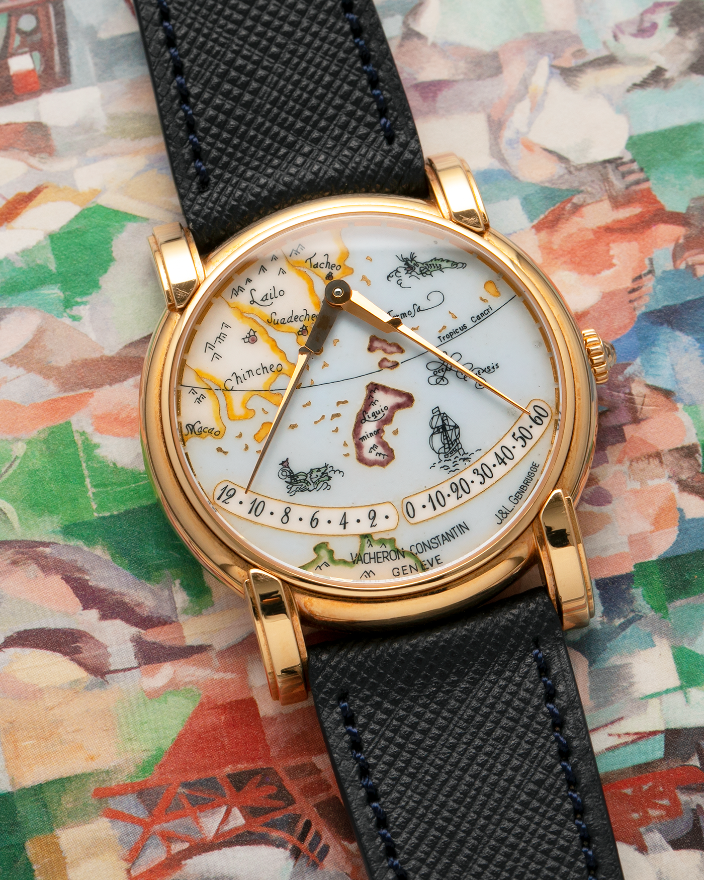 Brand: Vacheron Constantin
Year: 1998
Model: Mercator
Reference Number: 43050
Material: 18-carat Rose Gold Case, Champlevé Enamel Dial
Movement: Vacheron Constantin Cal. 1120/2 (Heavily-Modified Jaeger LeCoultre Cal. 920 Ébauche), Self-Winding
Case Dimensions: 36mm x 9mm (Lug-to-Lug 41mm)
Lug Width: 20mm
Strap: Molequin Dark Navy Textured Calf Leather Strap with Signed 18-carat Yellow Gold Deployant Buckle, extra Vacheron Constantin Black Alligator Leather Strap (Used)