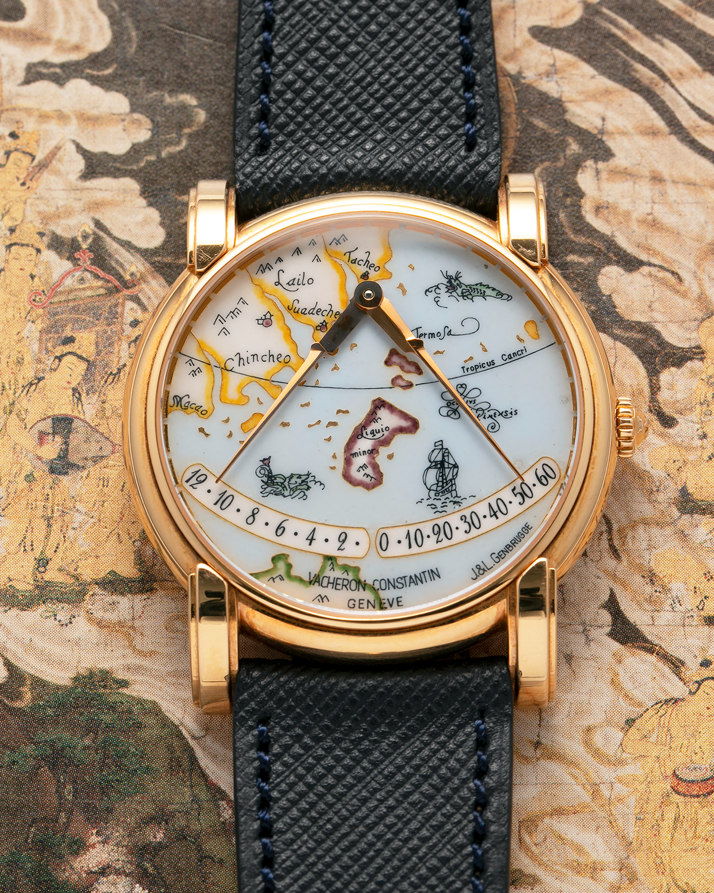 Brand: Vacheron Constantin
Year: 1998
Model: Mercator
Reference Number: 43050
Material: 18-carat Rose Gold Case, Champlevé Enamel Dial
Movement: Vacheron Constantin Cal. 1120/2 (Heavily-Modified Jaeger LeCoultre Cal. 920 Ébauche), Self-Winding
Case Dimensions: 36mm x 9mm (Lug-to-Lug 41mm)
Lug Width: 20mm
Strap: Molequin Dark Navy Textured Calf Leather Strap with Signed 18-carat Yellow Gold Deployant Buckle, extra Vacheron Constantin Black Alligator Leather Strap (Used)