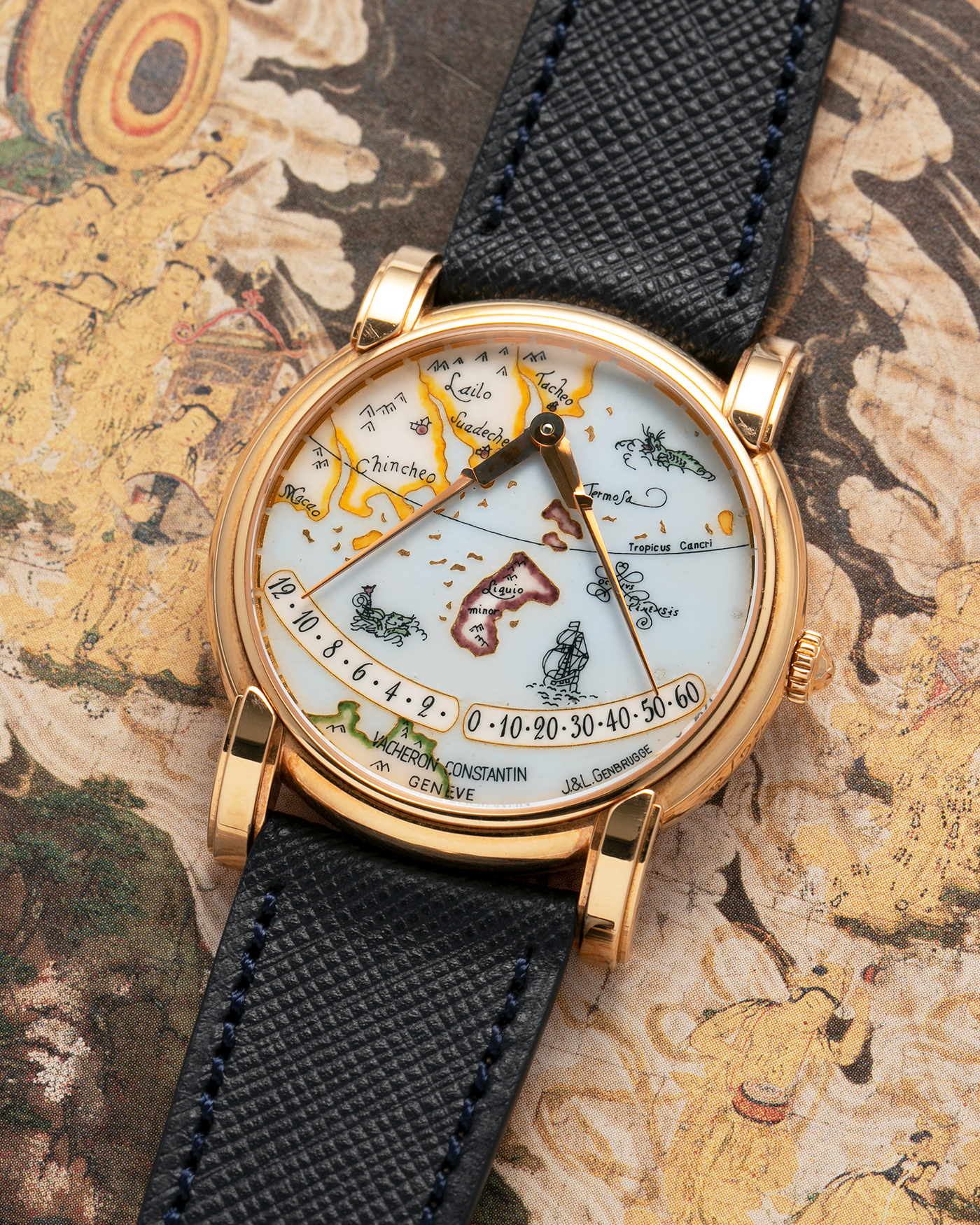 Brand: Vacheron Constantin
Year: 1998
Model: Mercator
Reference Number: 43050
Material: 18-carat Rose Gold Case, Champlevé Enamel Dial
Movement: Vacheron Constantin Cal. 1120/2 (Heavily-Modified Jaeger LeCoultre Cal. 920 Ébauche), Self-Winding
Case Dimensions: 36mm x 9mm (Lug-to-Lug 41mm)
Lug Width: 20mm
Strap: Molequin Dark Navy Textured Calf Leather Strap with Signed 18-carat Yellow Gold Deployant Buckle, extra Vacheron Constantin Black Alligator Leather Strap (Used)